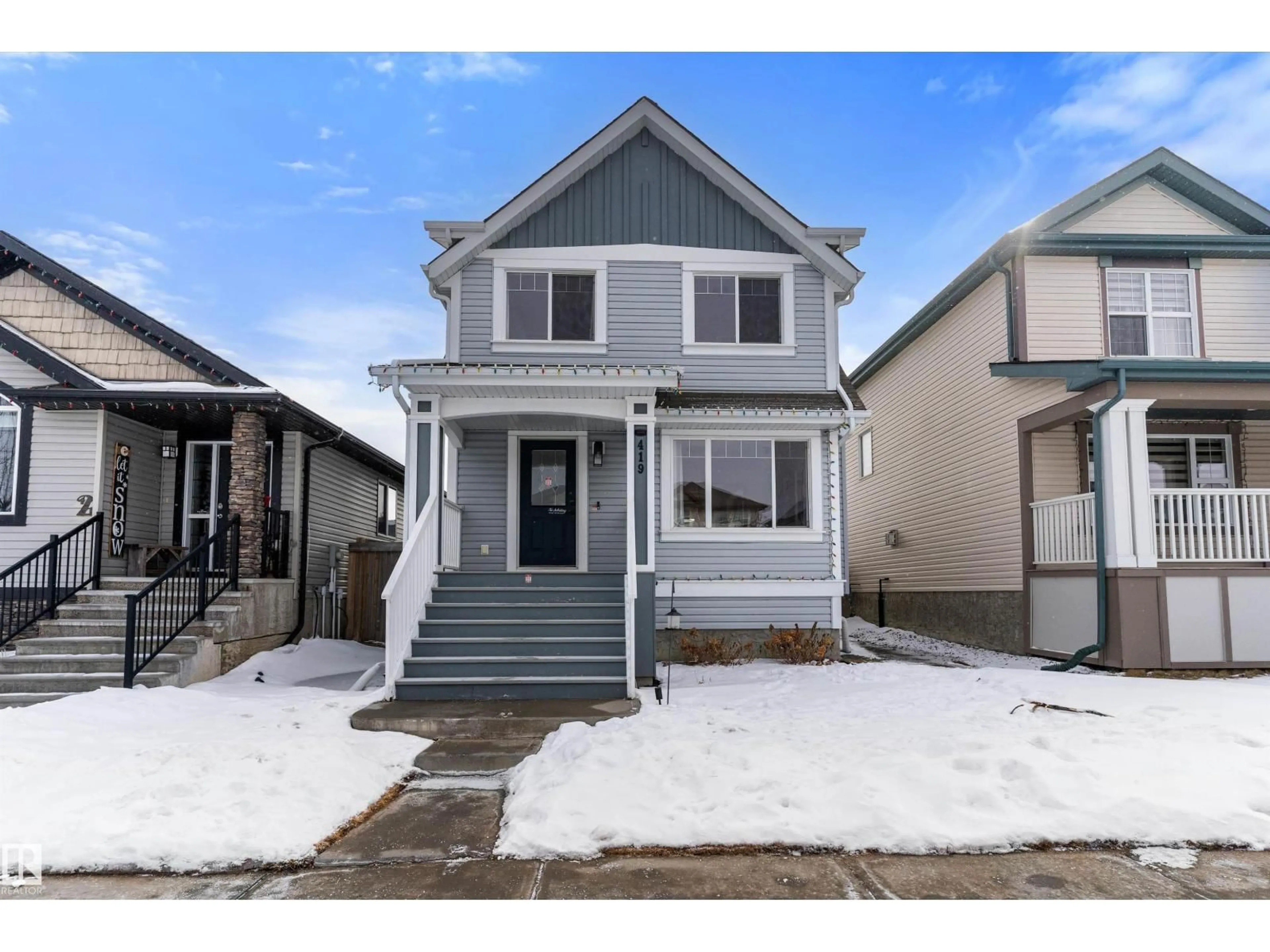 Home with vinyl exterior material, street for 419 SONGHURST PL, Leduc Alberta T9E0P7