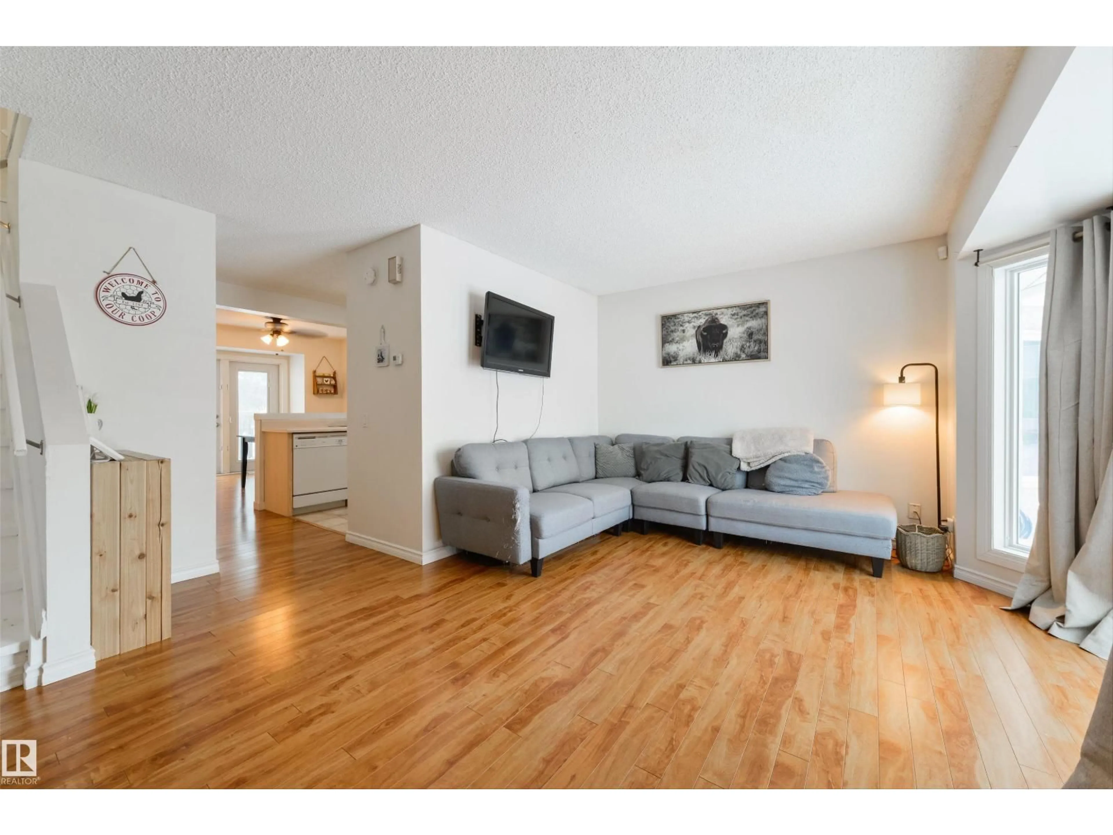 Living room with furniture, wood/laminate floor for 5 - 123 ABERDEEN WY, Stony Plain Alberta T7Z1N1