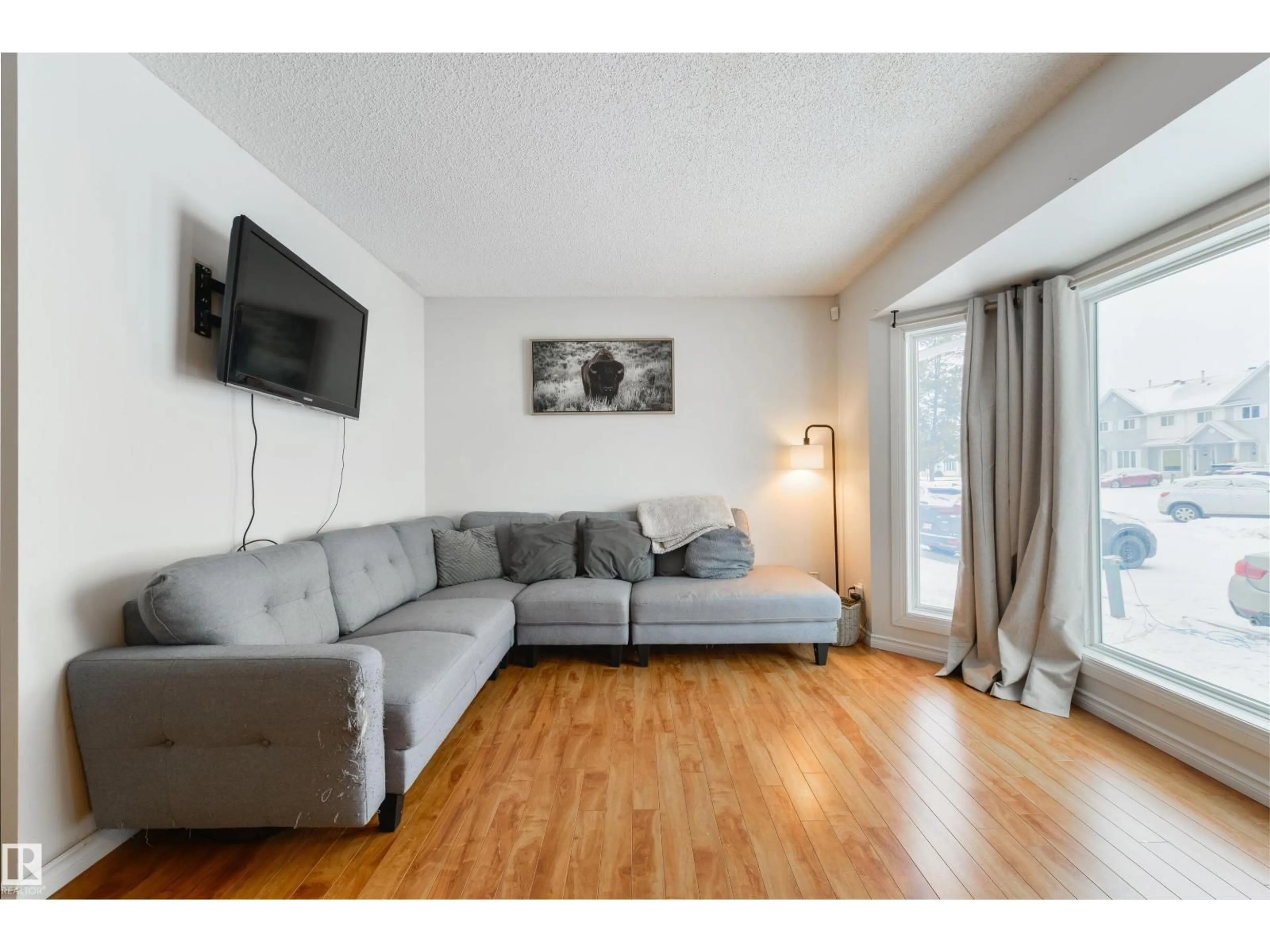 Living room with furniture, wood/laminate floor for 5 - 123 ABERDEEN WY, Stony Plain Alberta T7Z1N1