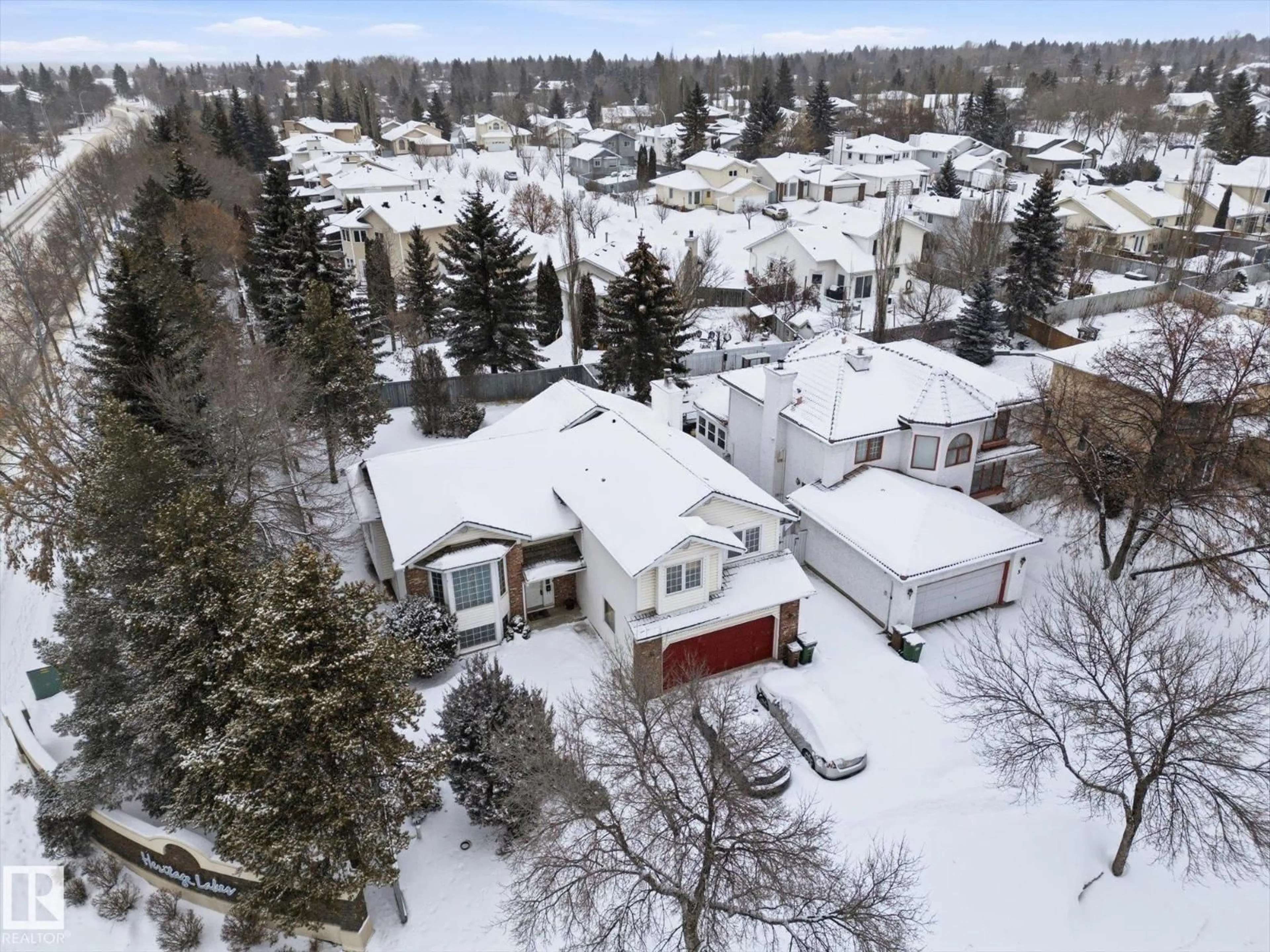 A pic from outside/outdoor area/front of a property/back of a property/a pic from drone, street for 1 HERITAGE BV, St. Albert Alberta T8N5P8