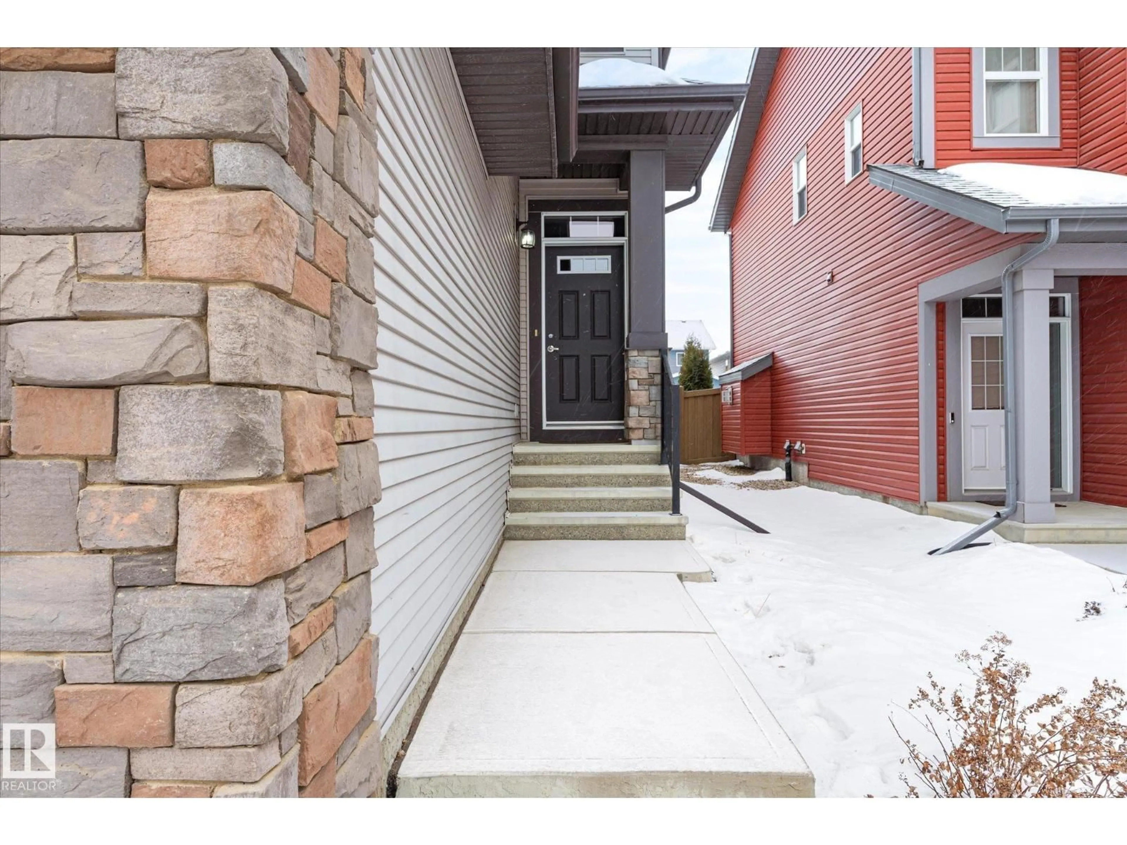 Home with brick exterior material, street for NW - 5916 175 AV, Edmonton Alberta T5Y0T4