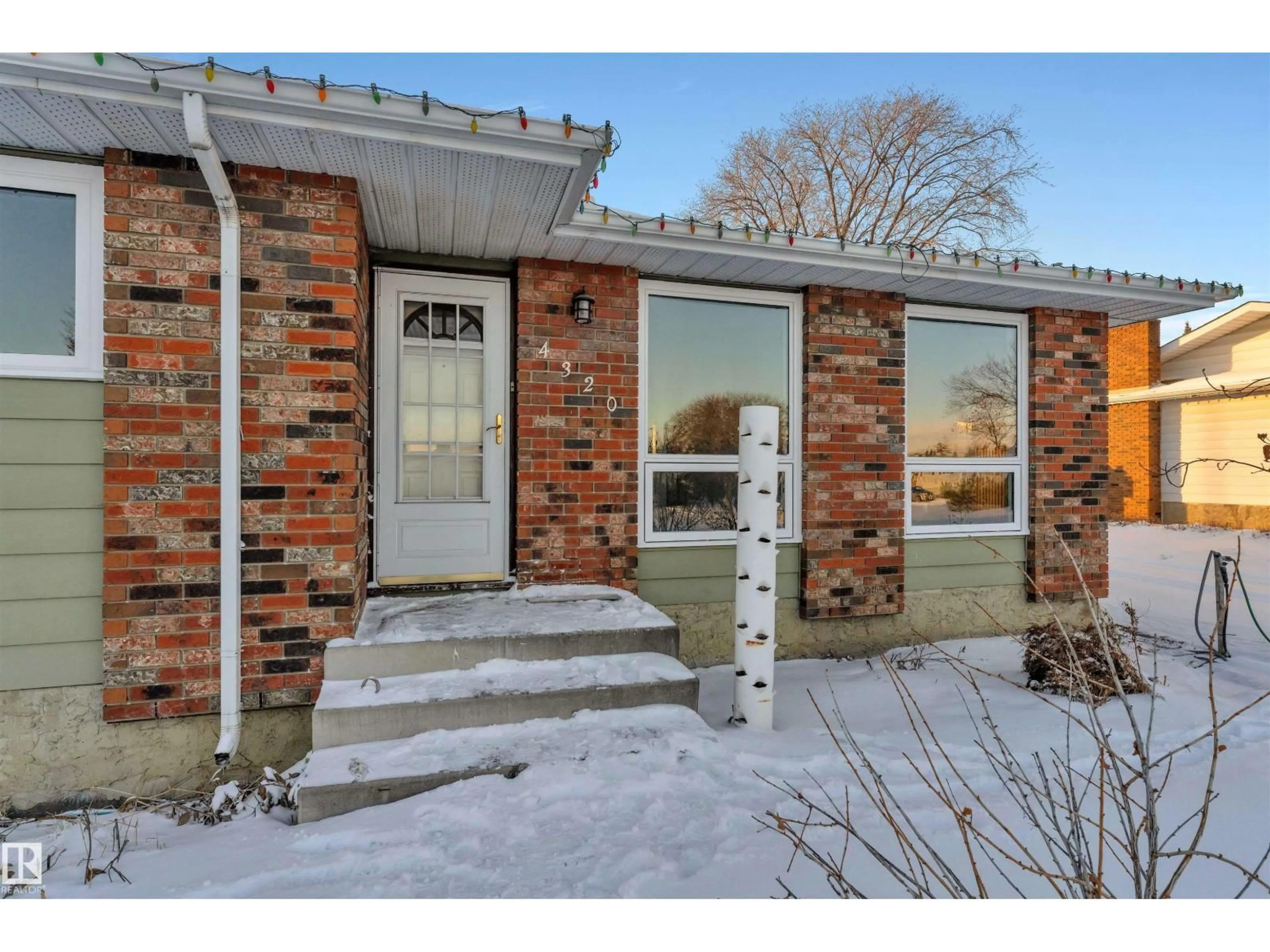 Home with brick exterior material, street for 4320 74 ST, Edmonton Alberta T6K0W2