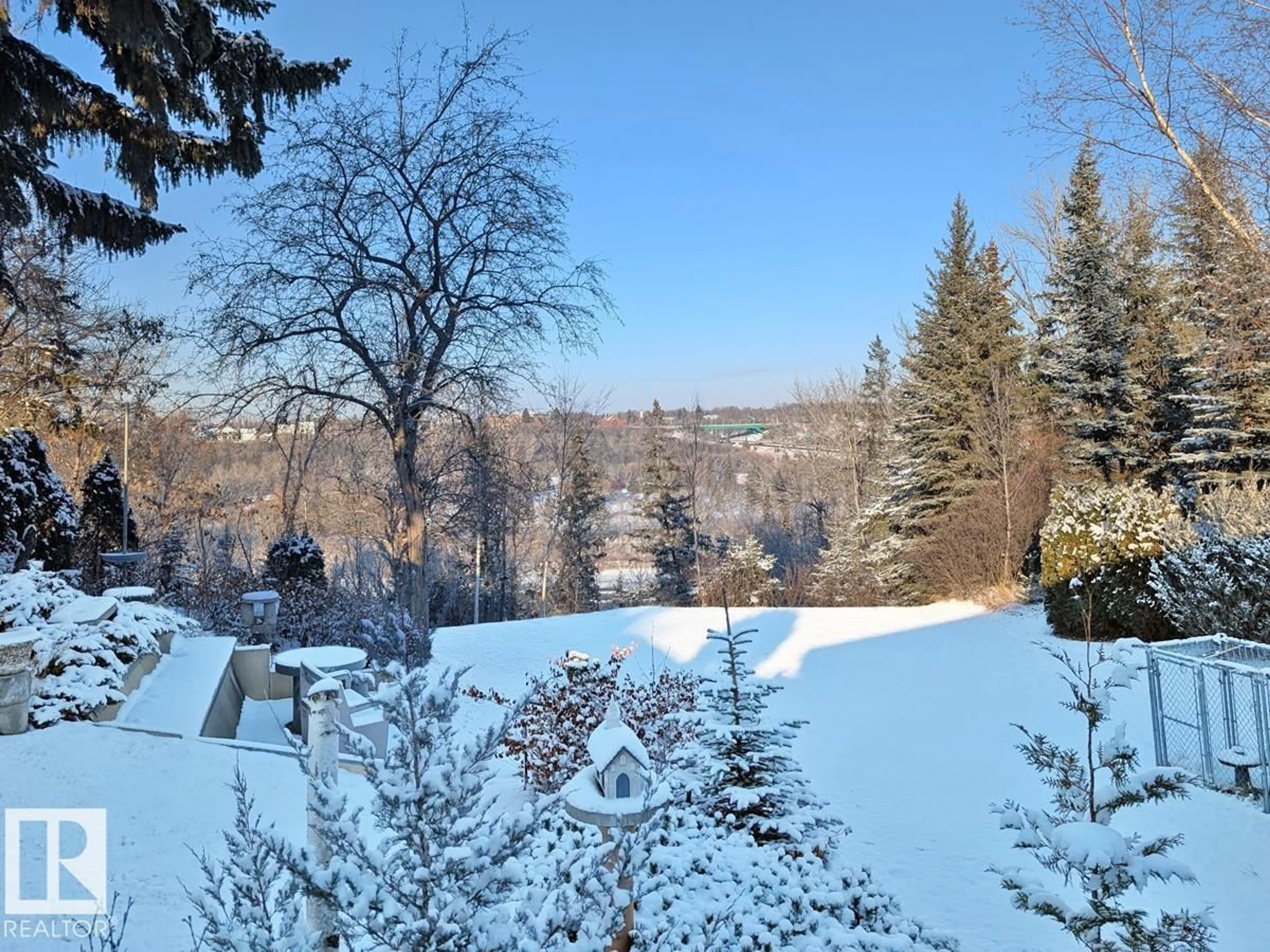 A pic from outside/outdoor area/front of a property/back of a property/a pic from drone, forest/trees view for 7404 ROWLAND RD, Edmonton Alberta T6A3W1
