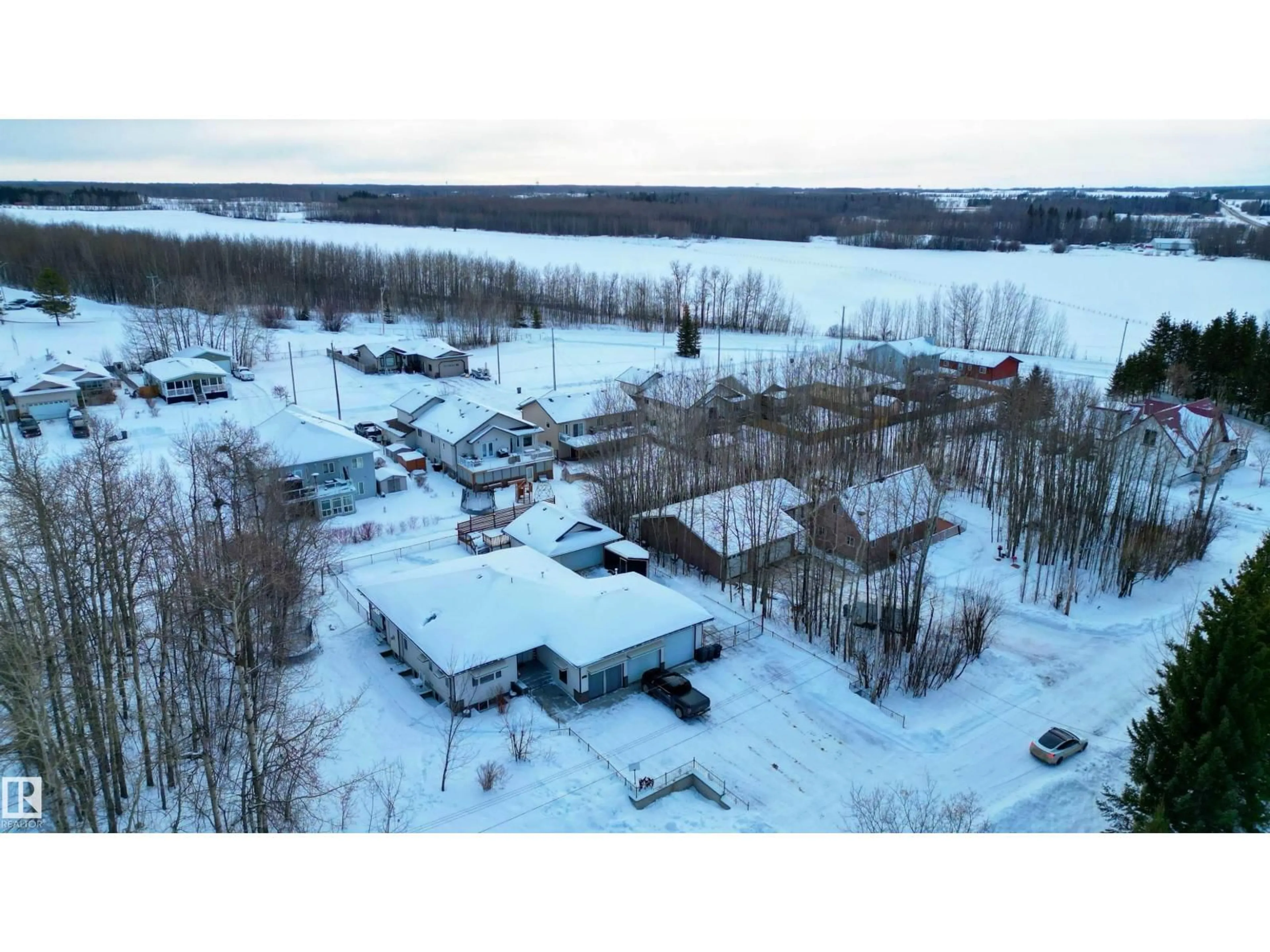 A pic from outside/outdoor area/front of a property/back of a property/a pic from drone, water/lake/river/ocean view for 21 POWER DR, Rural Lac Ste. Anne County Alberta T0E0A0