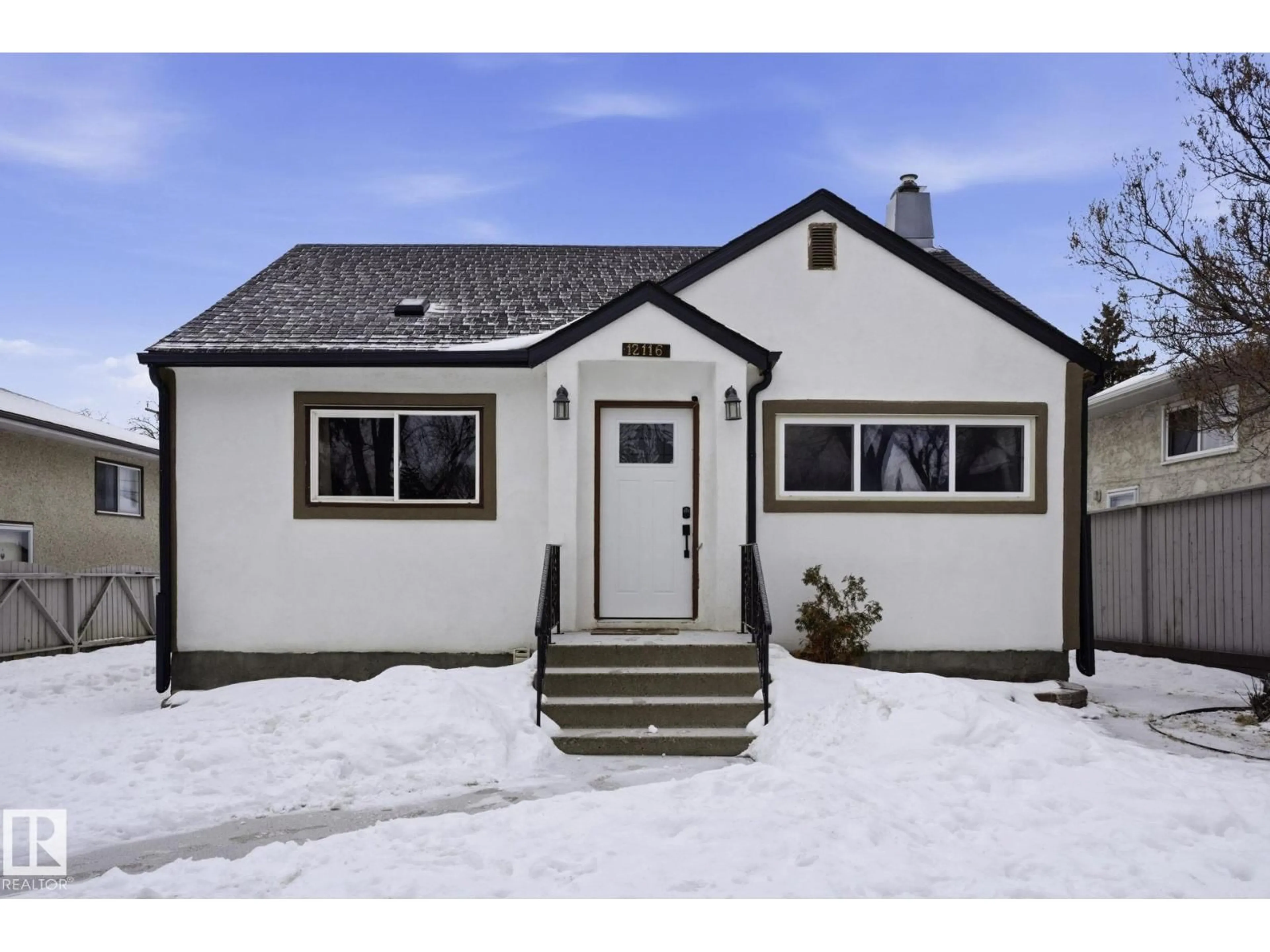 Home with vinyl exterior material, street for NW - 12116 81 ST, Edmonton Alberta T5B2T1