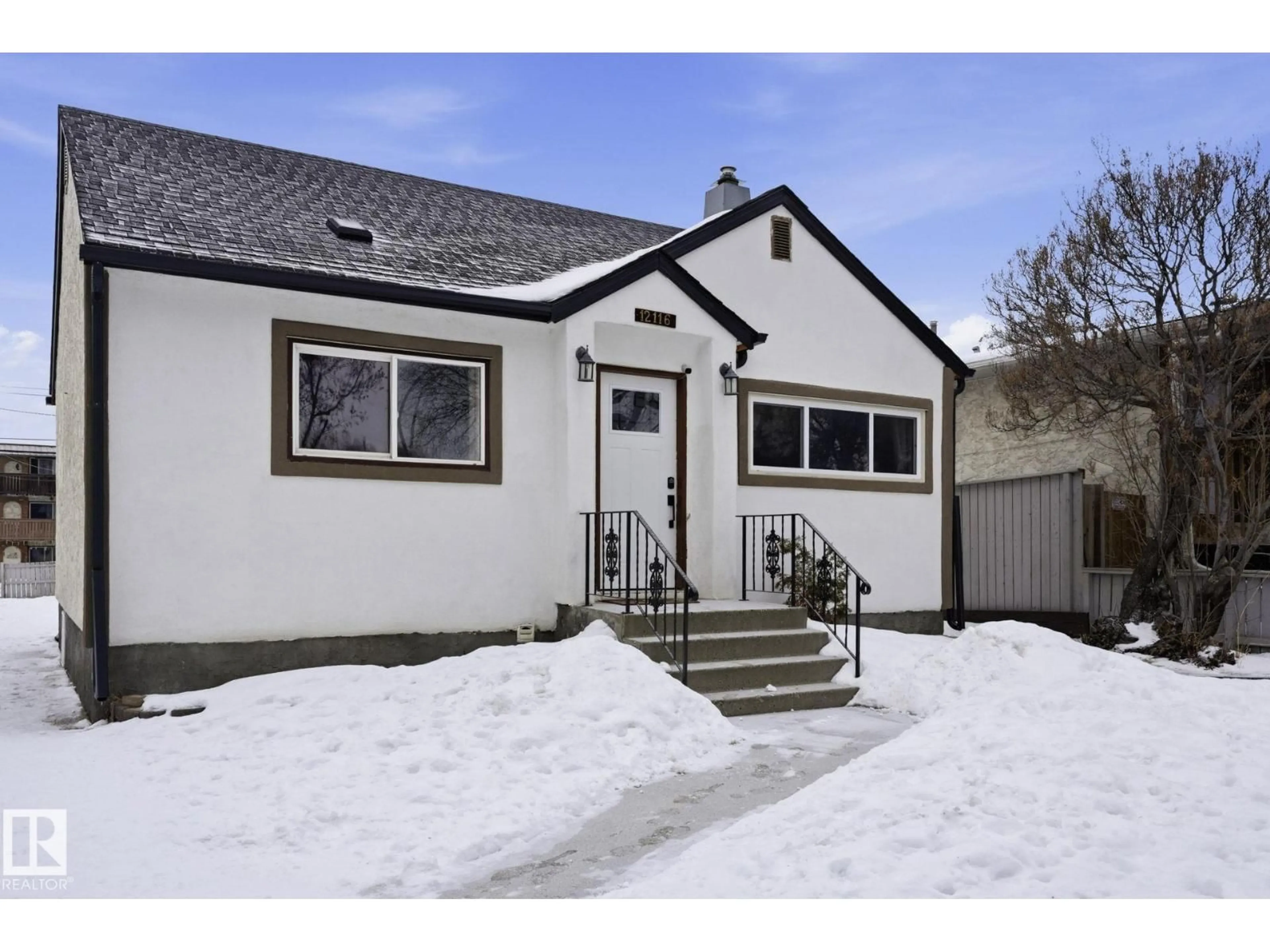 Home with vinyl exterior material, street for NW - 12116 81 ST, Edmonton Alberta T5B2T1