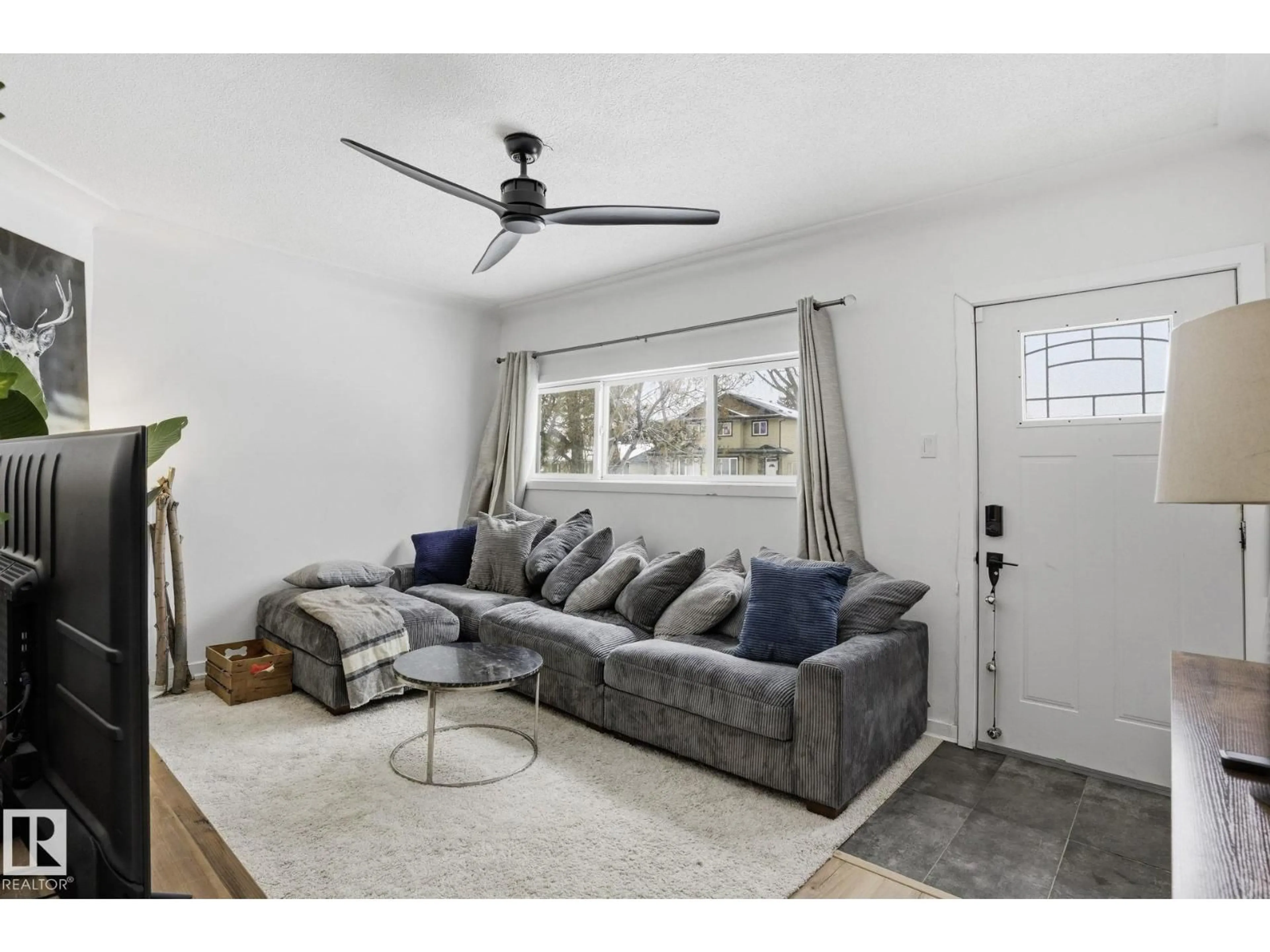 Living room with furniture, unknown for NW - 12116 81 ST, Edmonton Alberta T5B2T1