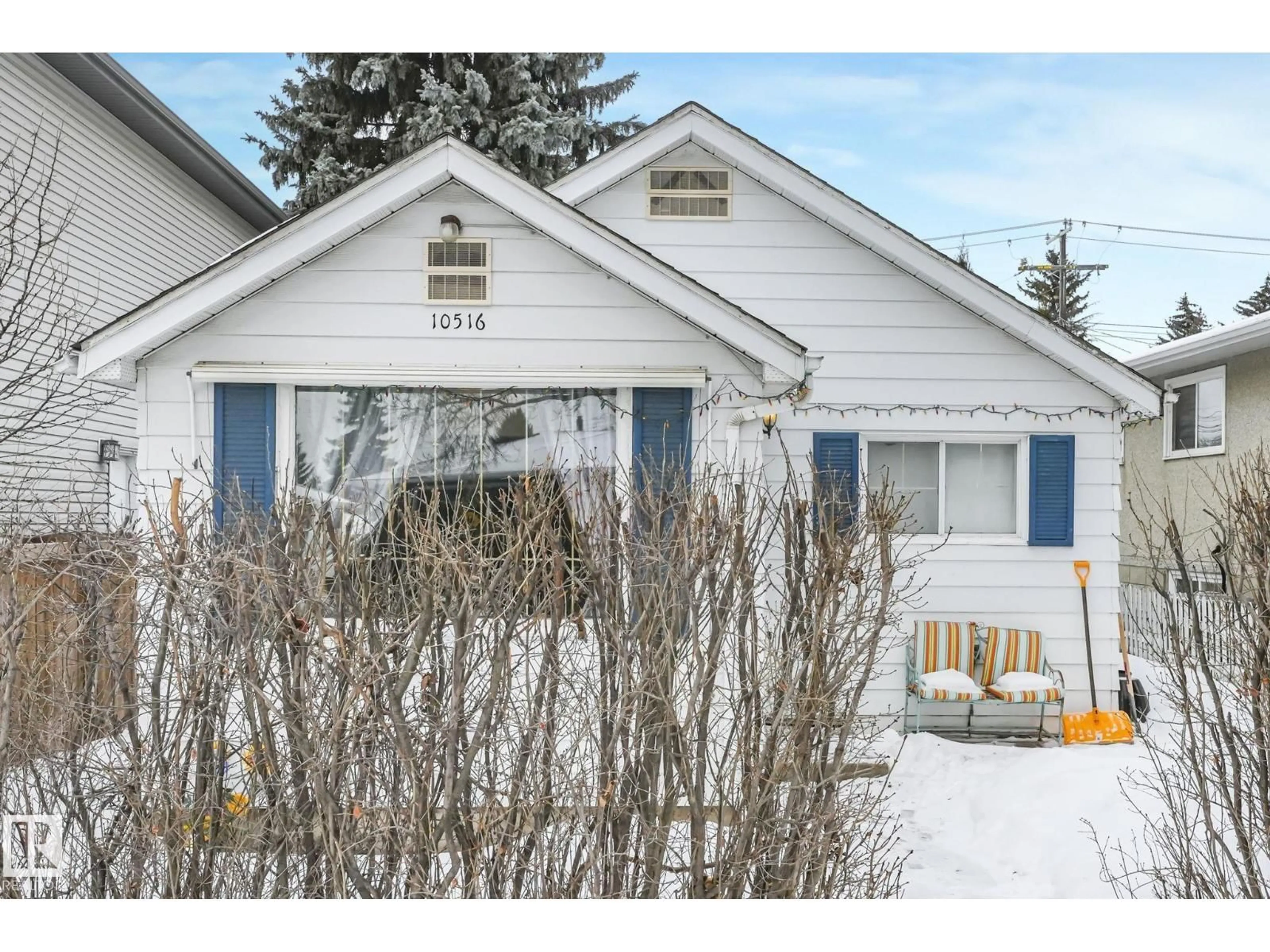 Home with vinyl exterior material, street for 10516 63 AV, Edmonton Alberta T6H1P4