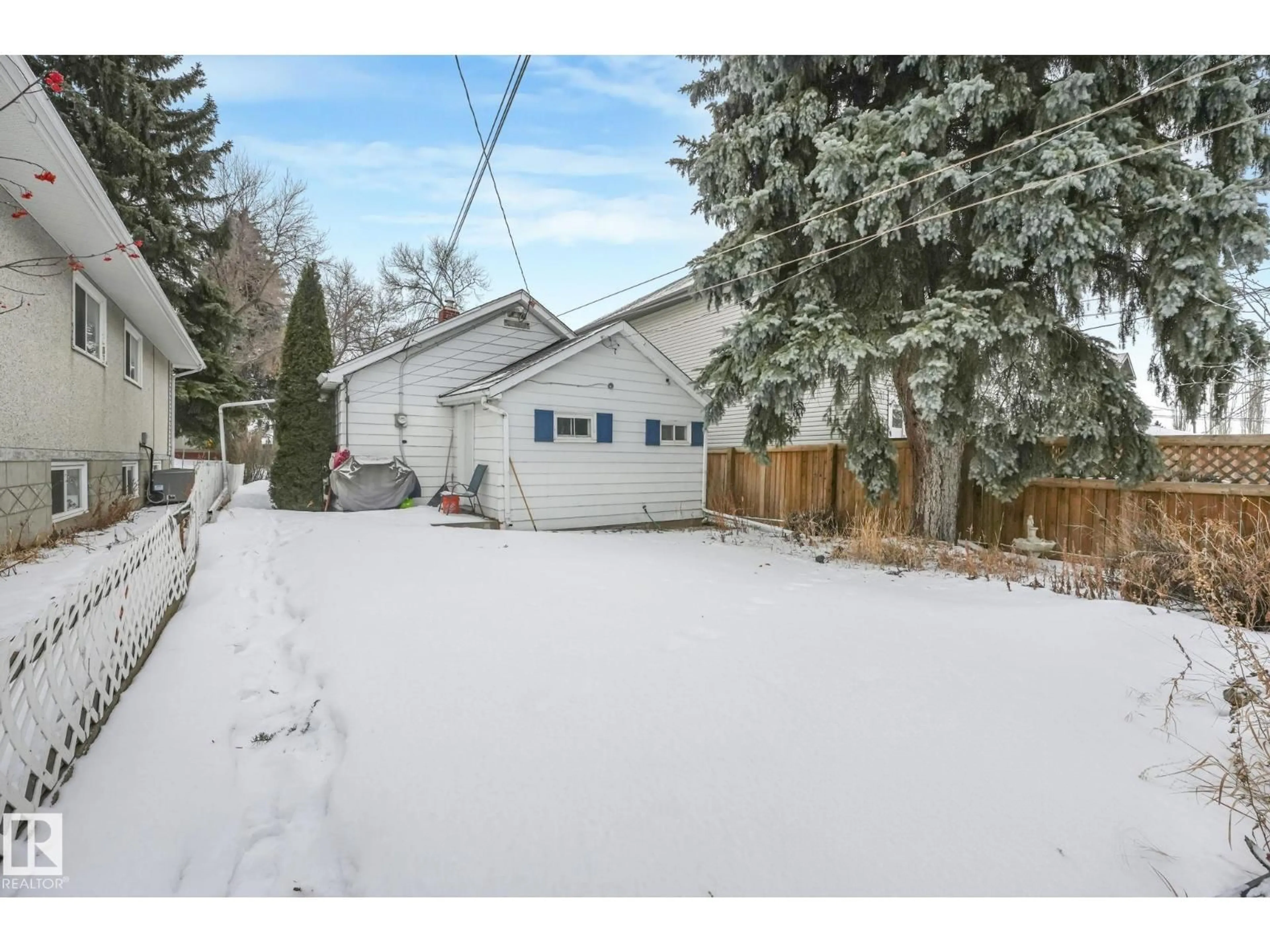 A pic from outside/outdoor area/front of a property/back of a property/a pic from drone, street for 10516 63 AV, Edmonton Alberta T6H1P4
