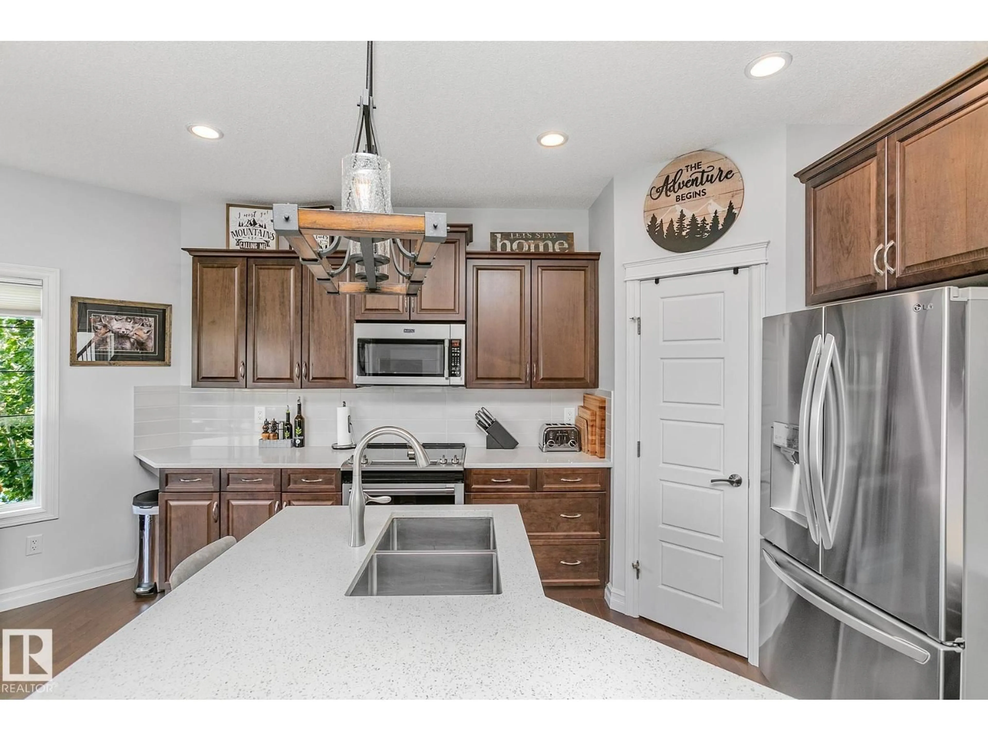 Open concept kitchen, ceramic/tile floor for 17 SWEETBERRY CV, Leduc Alberta T9E0L5