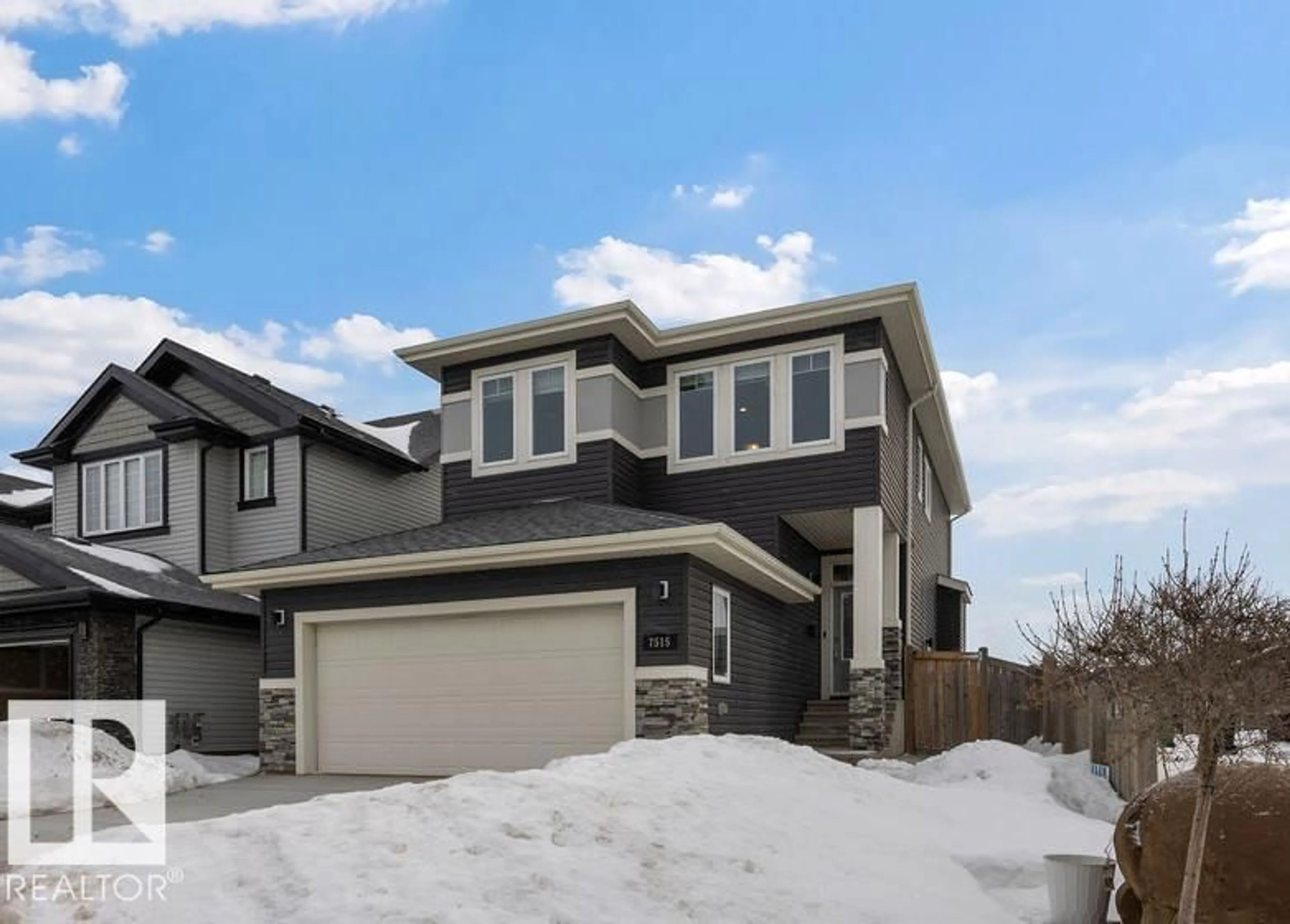 Home with brick exterior material, street for NW - 7515 178 AV, Edmonton Alberta T5Z0E2