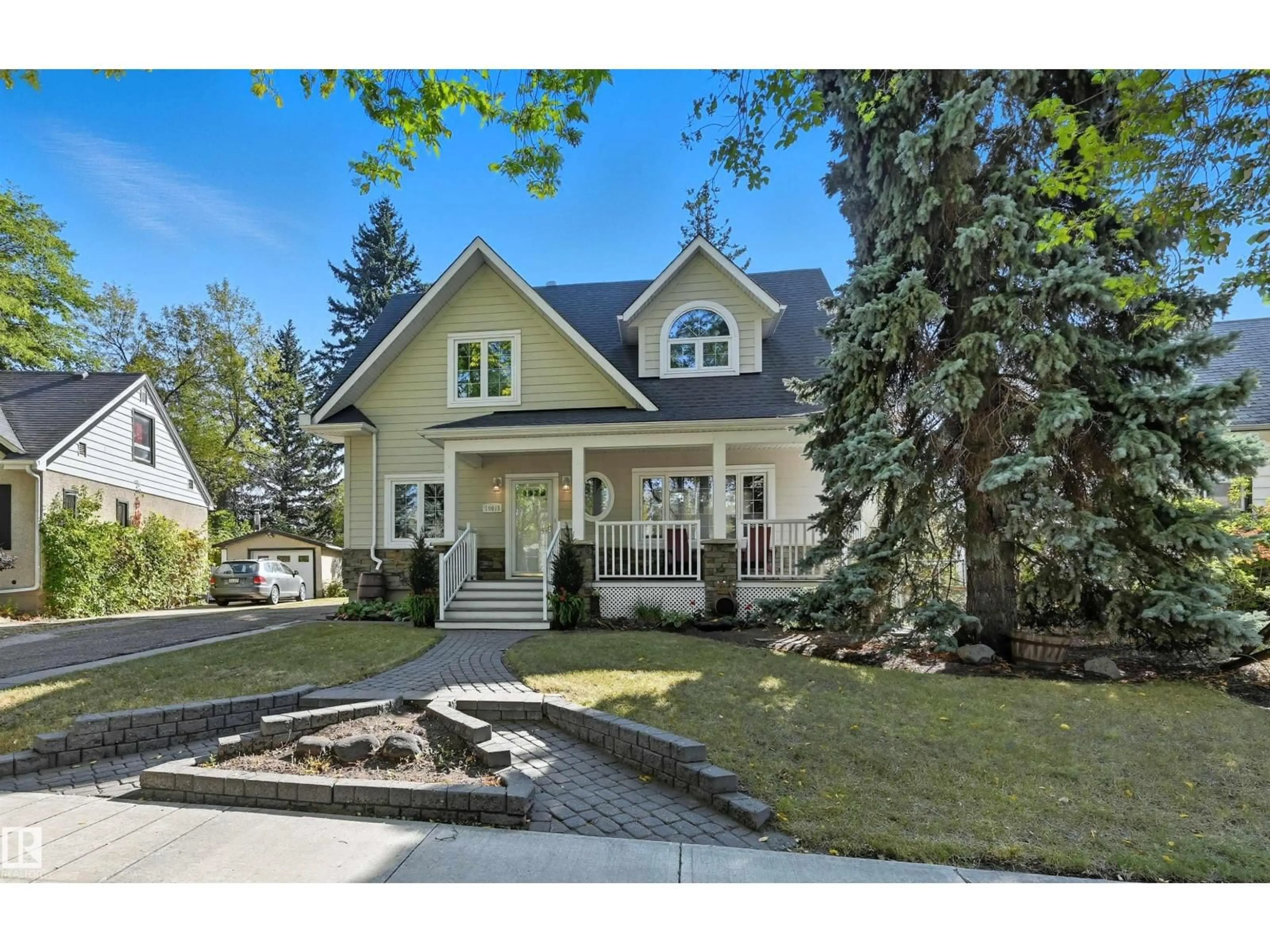 Home with vinyl exterior material, street for NW - 10915 62 AV, Edmonton Alberta T6H1N3