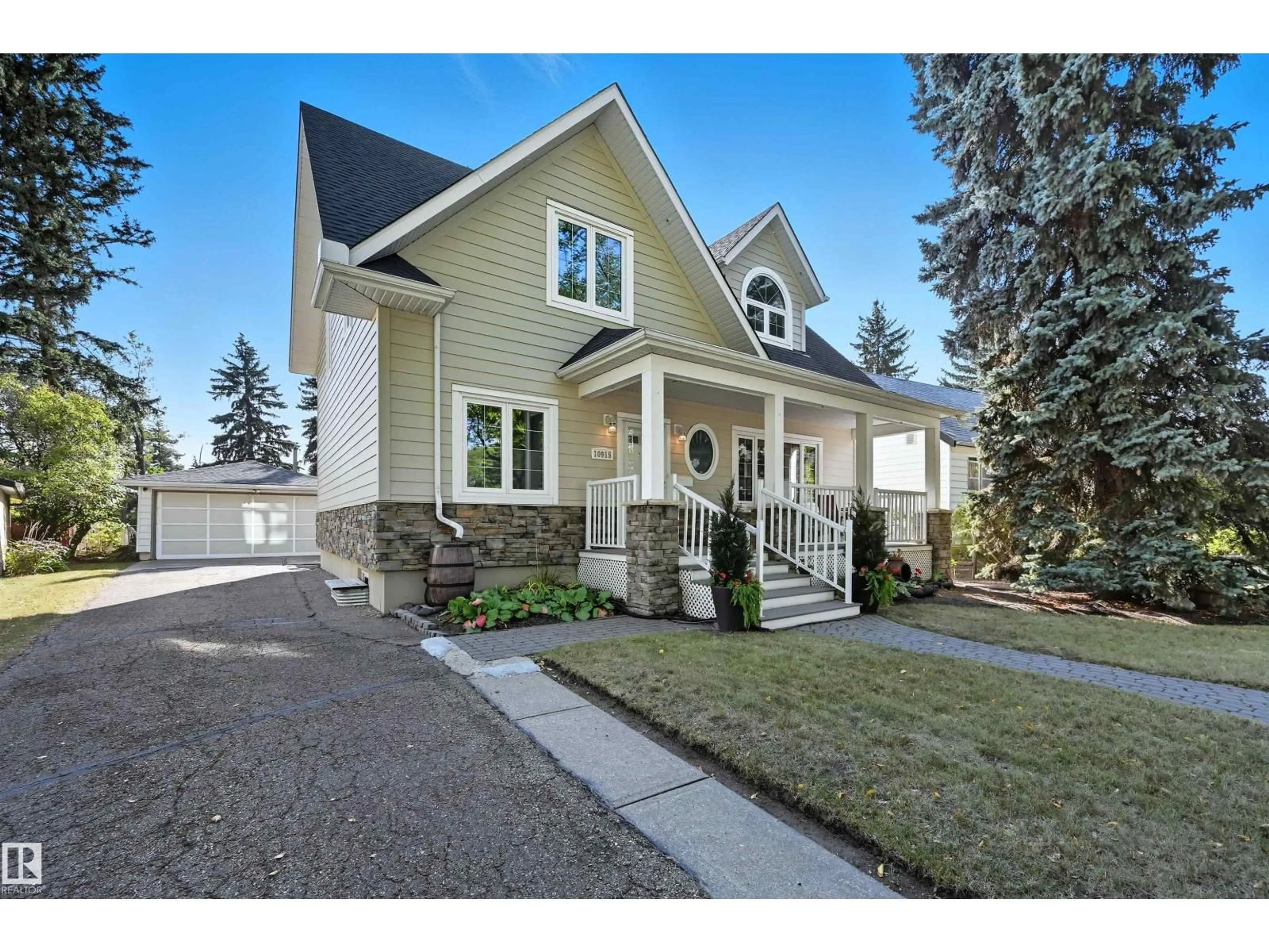 Home with vinyl exterior material, street for NW - 10915 62 AV, Edmonton Alberta T6H1N3