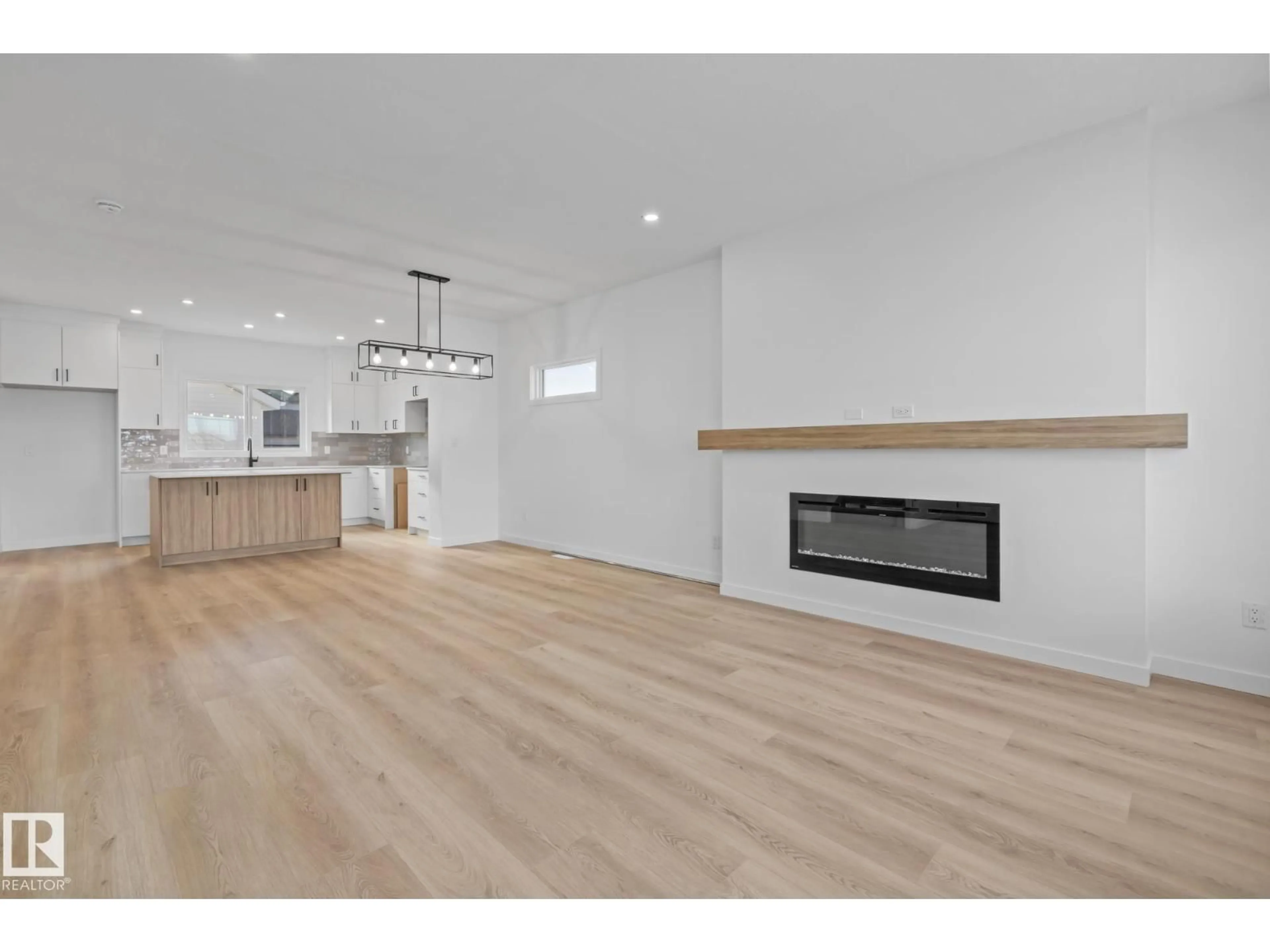 Open concept kitchen, wood/laminate floor for 54 EDEN LI, Fort Saskatchewan Alberta T8L0Z2