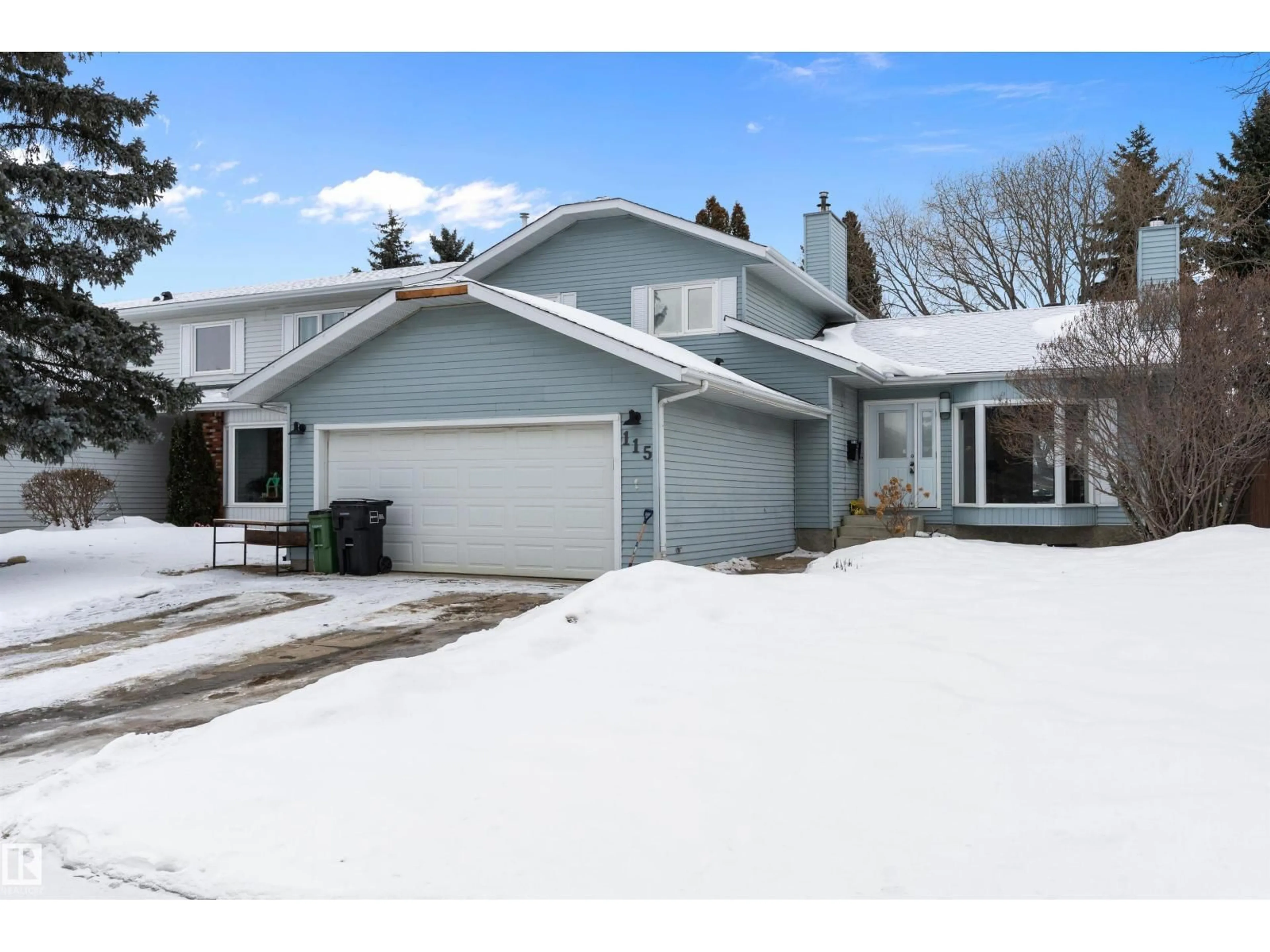 Home with vinyl exterior material, street for 115 WALKER RD, Edmonton Alberta T5T4C2