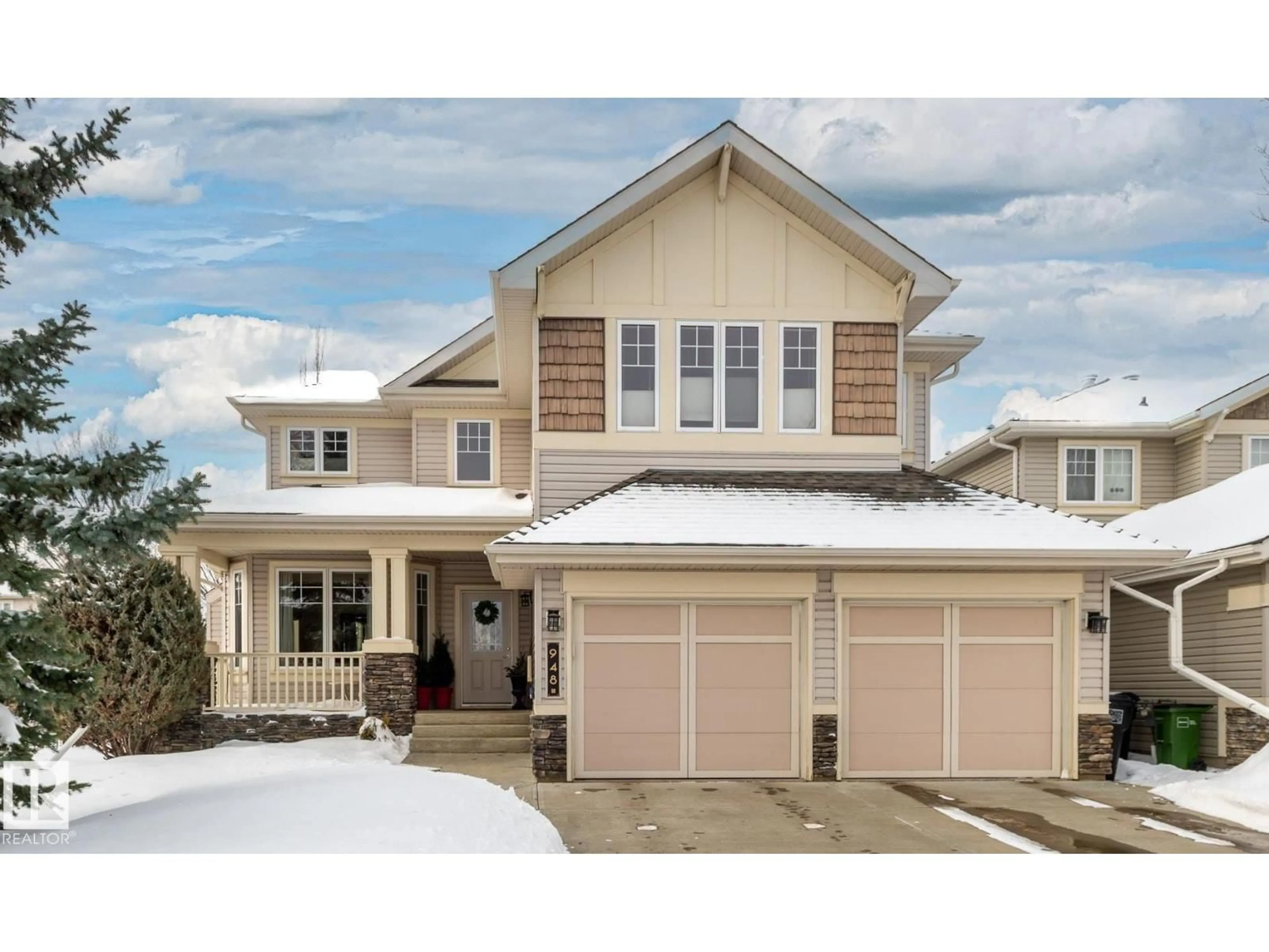 Home with vinyl exterior material, street for 948 HOPE WY, Edmonton Alberta T6M3A2