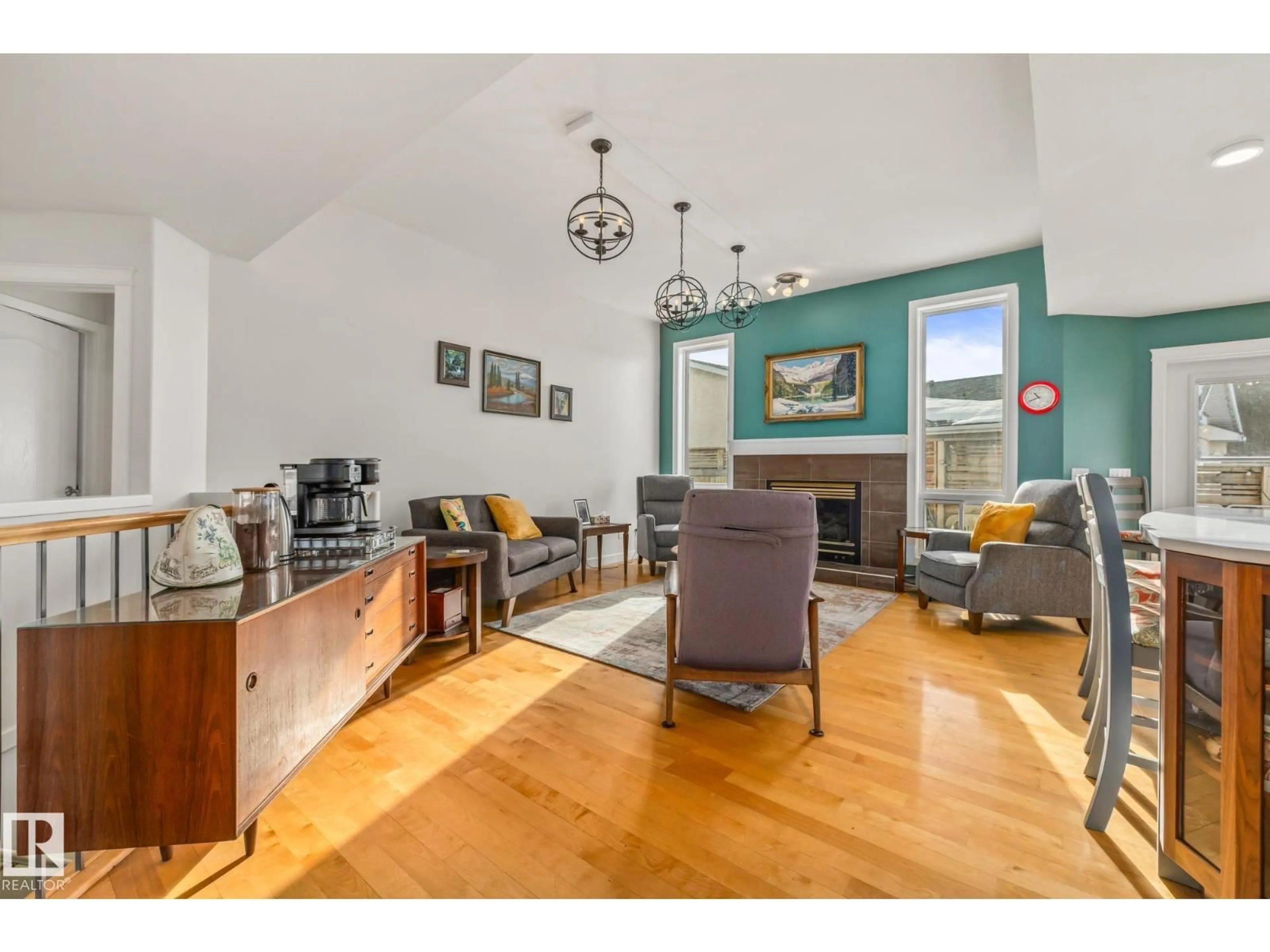 Living room with furniture, wood/laminate floor for 203 BANCROFT CL, Edmonton Alberta T5T6B5