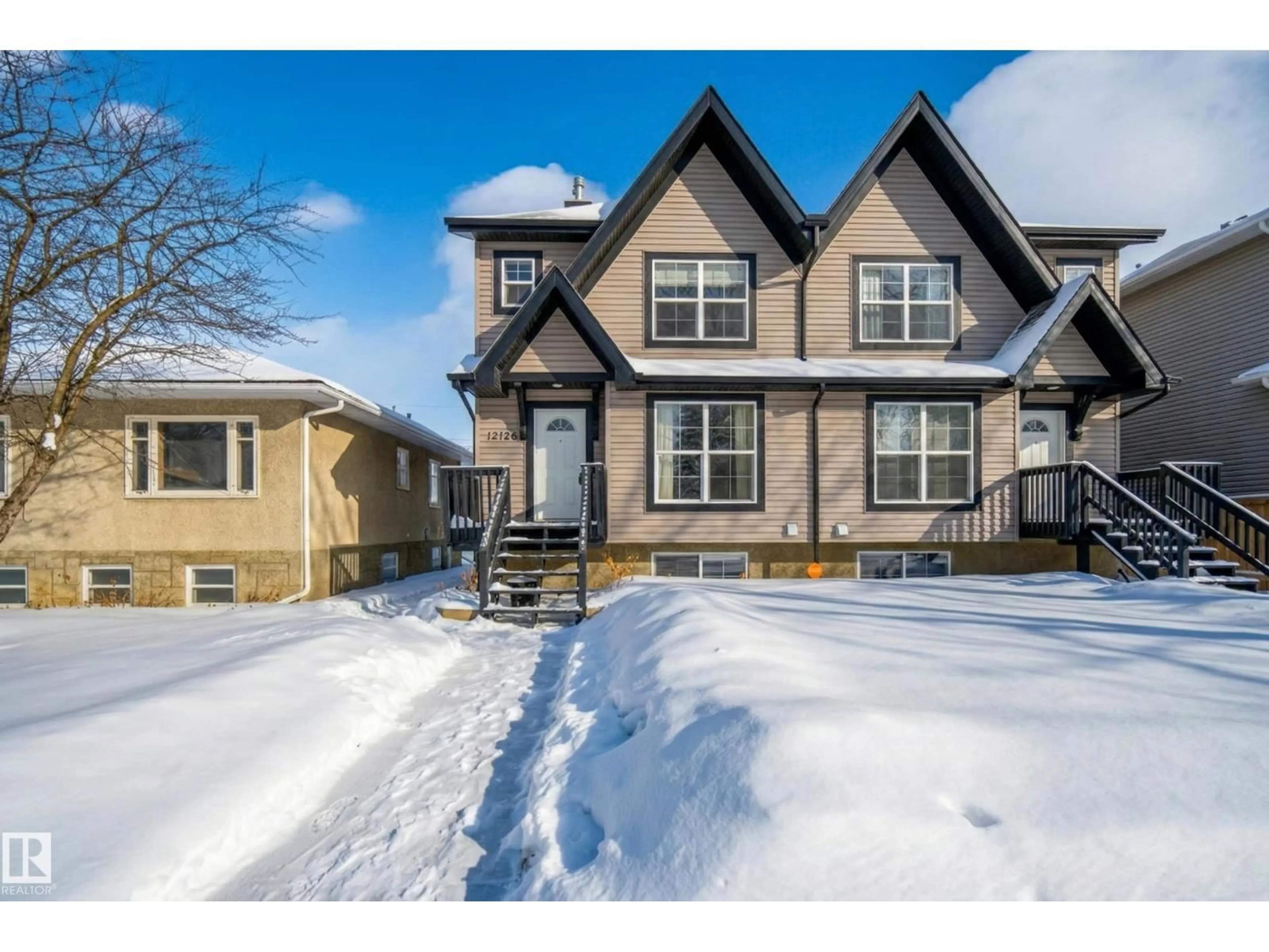 Home with vinyl exterior material, street for NW - 12126 85 ST, Edmonton Alberta T5B3B6