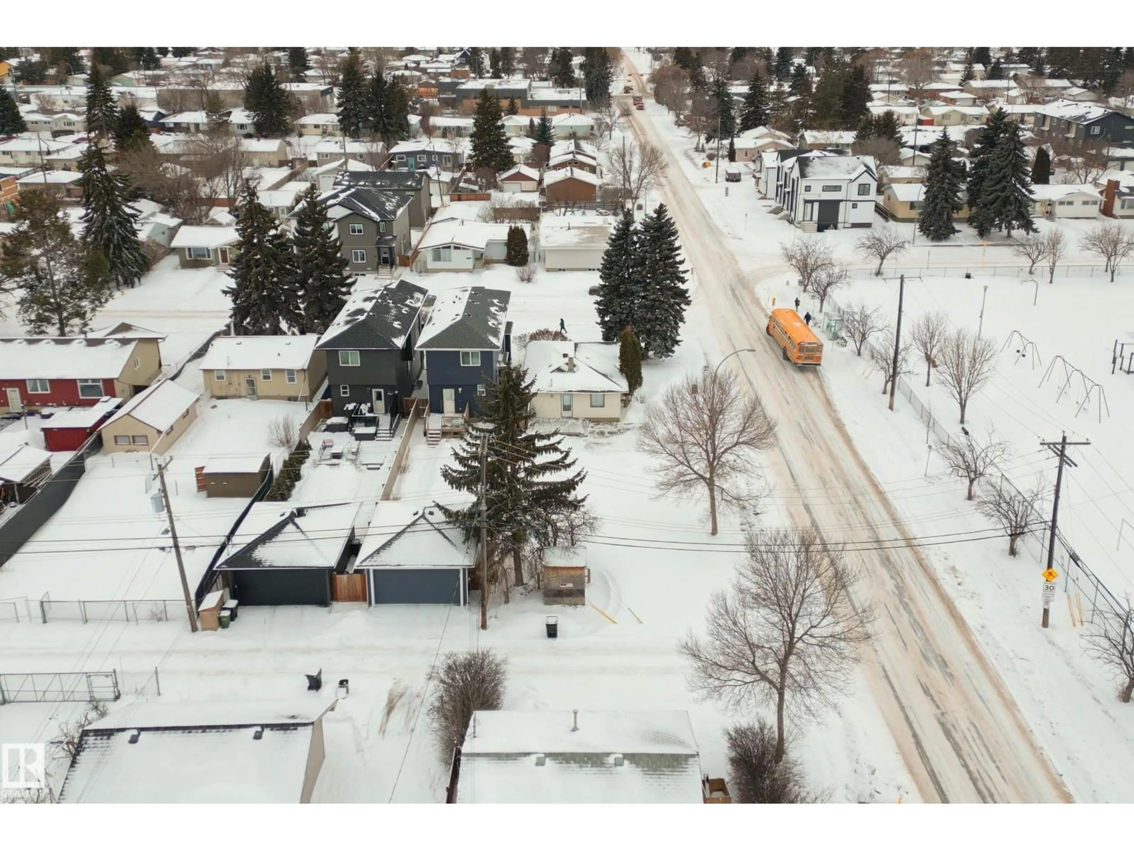 A pic from outside/outdoor area/front of a property/back of a property/a pic from drone, street for 15321 110 AV, Edmonton Alberta T5P1E4