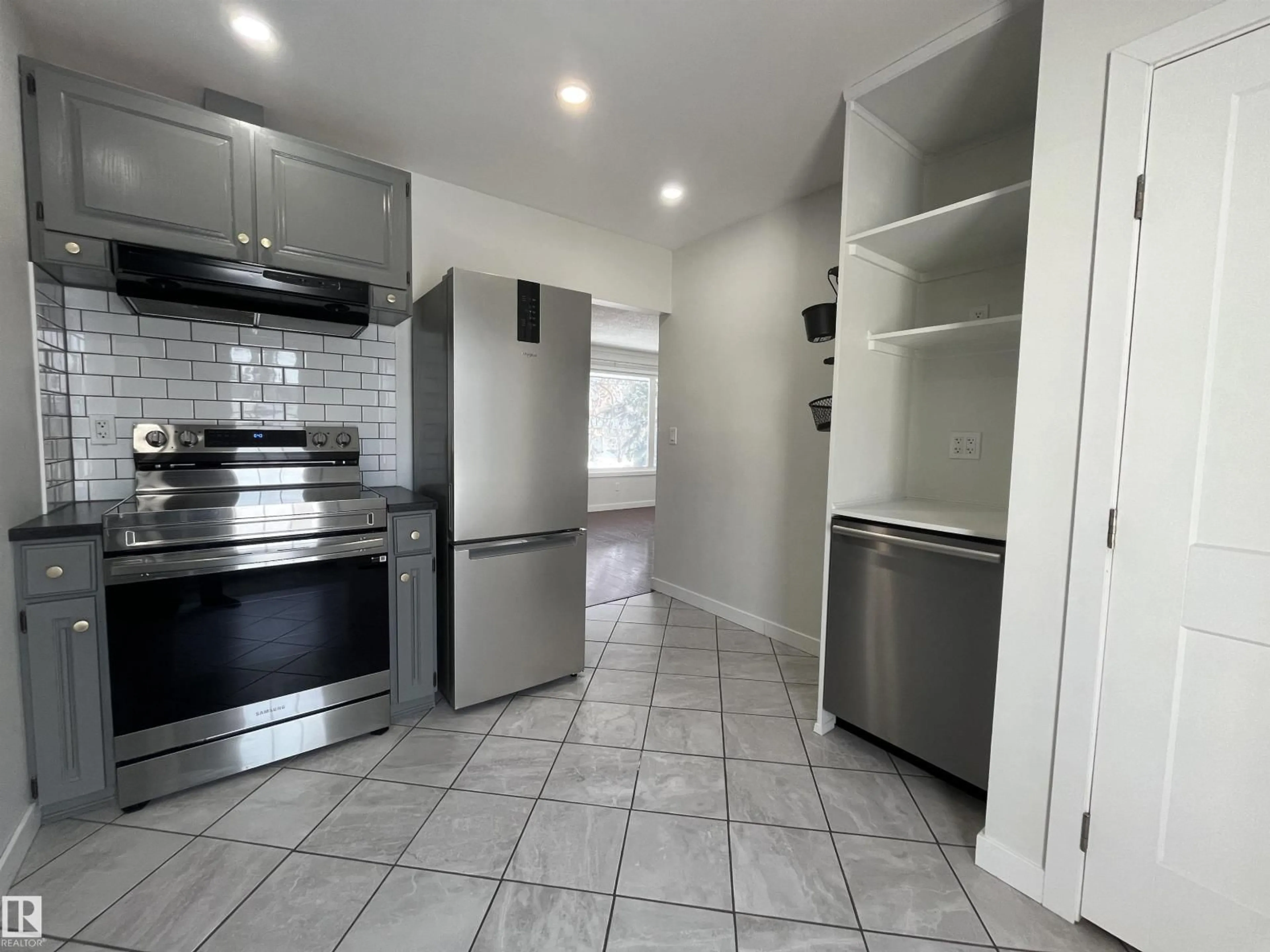 Standard kitchen, ceramic/tile floor for NW - 10832 163 ST, Edmonton Alberta T5P3P6
