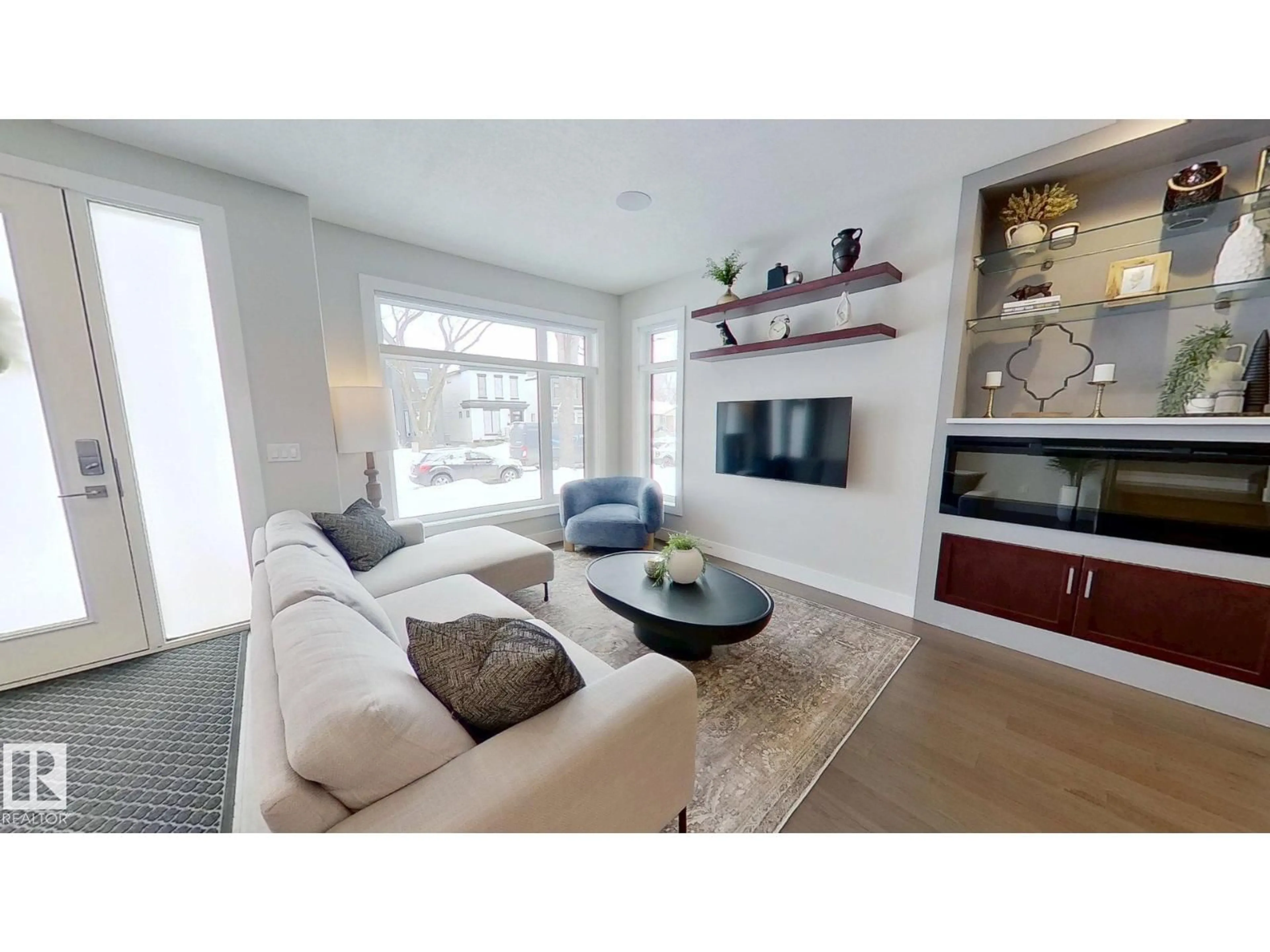 Living room with furniture, unknown for 10520 83 ST, Edmonton Alberta T6A3P4