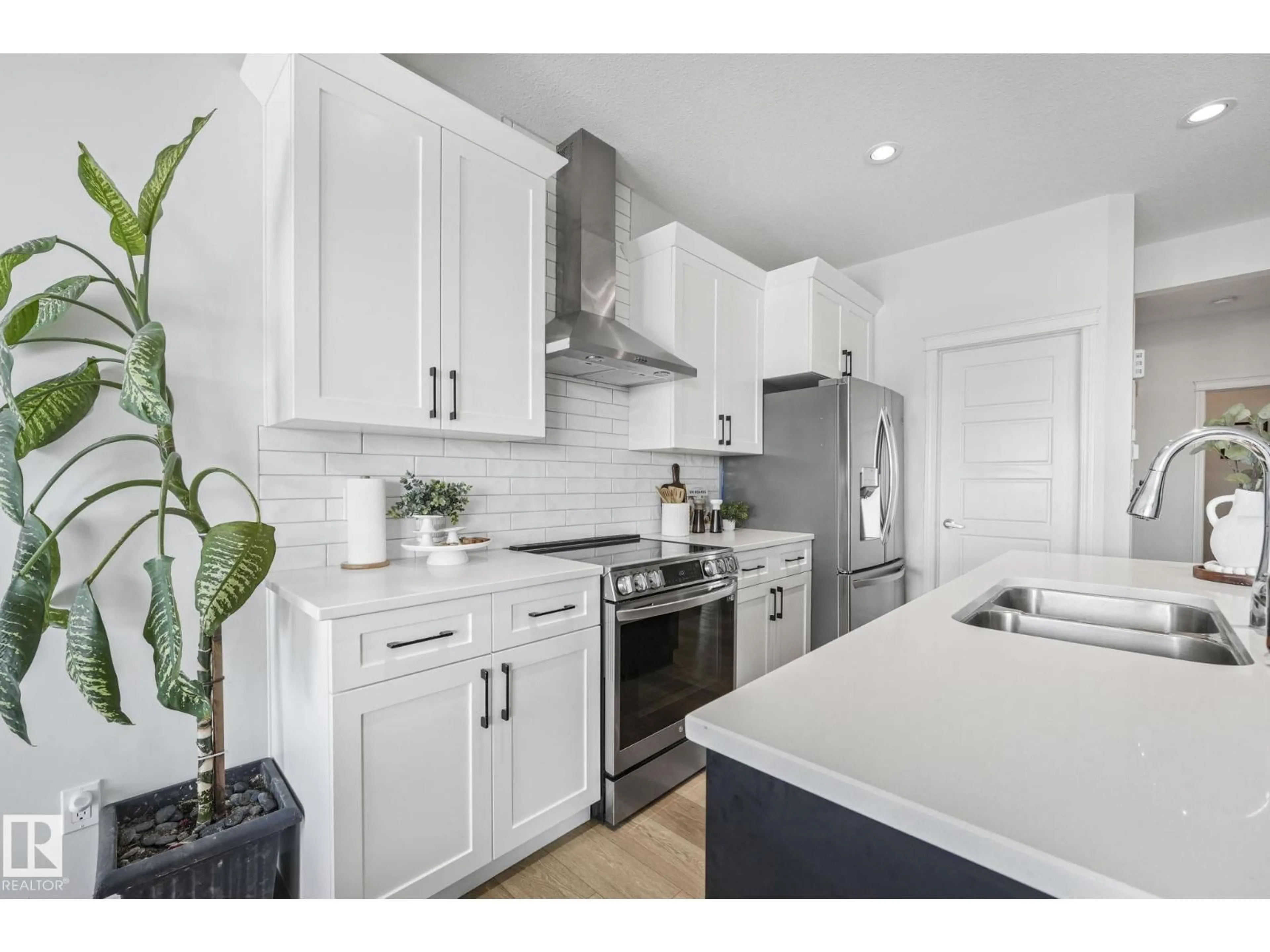 Open concept kitchen, ceramic/tile floor for 6417 66 ST, Beaumont Alberta T4X2P6