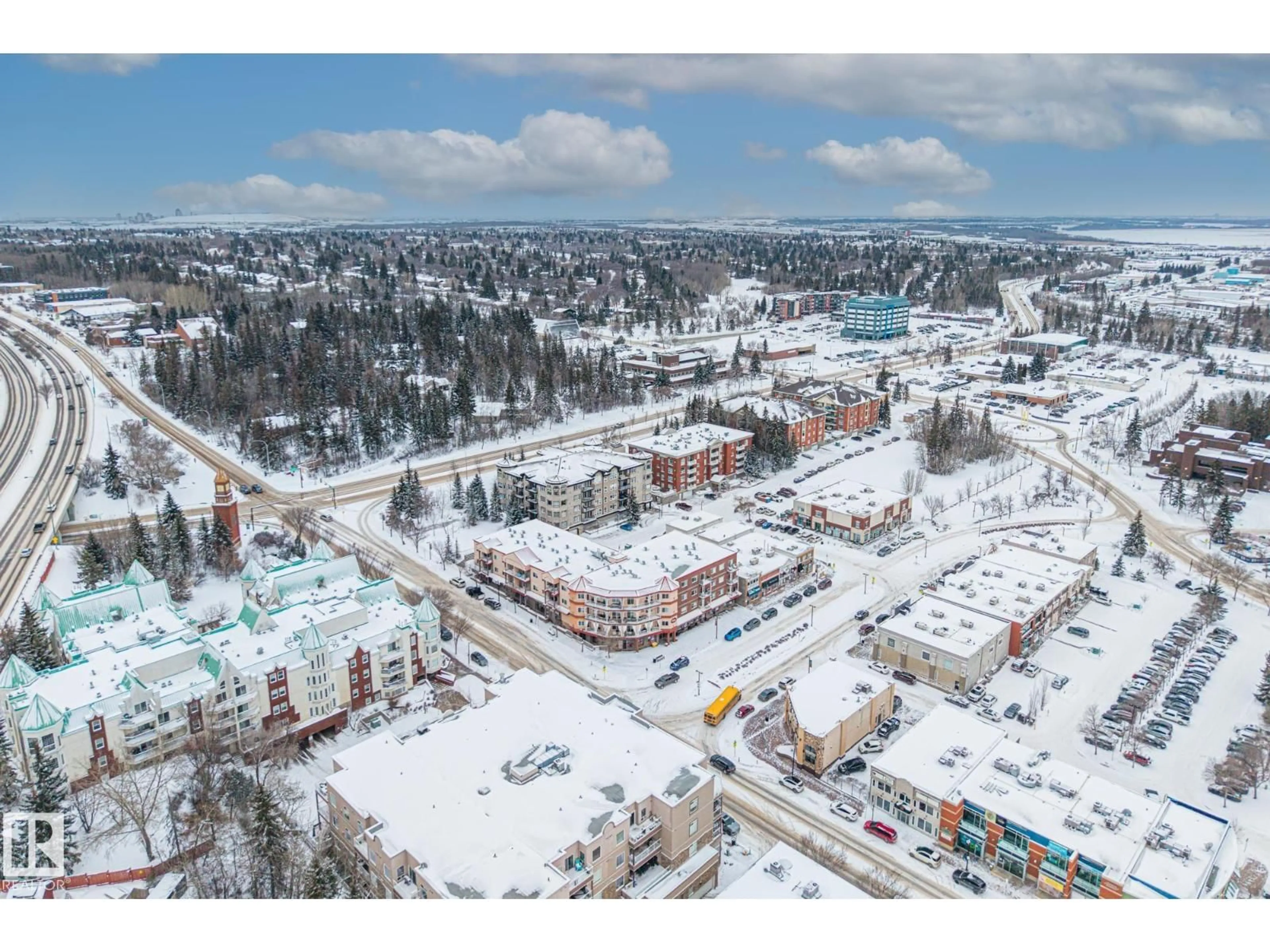 A pic from outside/outdoor area/front of a property/back of a property/a pic from drone, mountain view for #402 - 50 ST THOMAS ST, St. Albert Alberta T8N6Z8