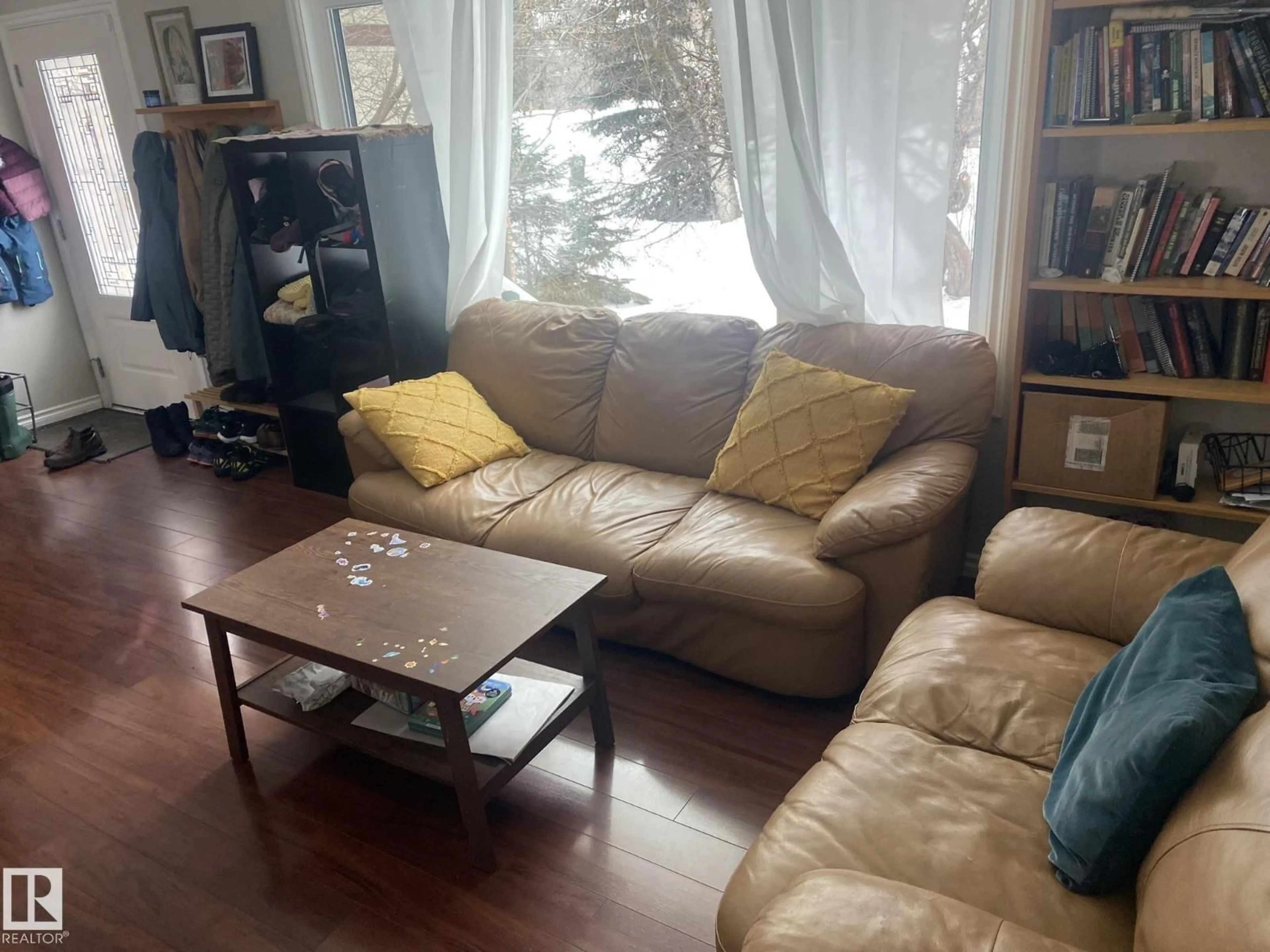 Living room with furniture, unknown for 10945 54 AV, Edmonton Alberta T6H0V2