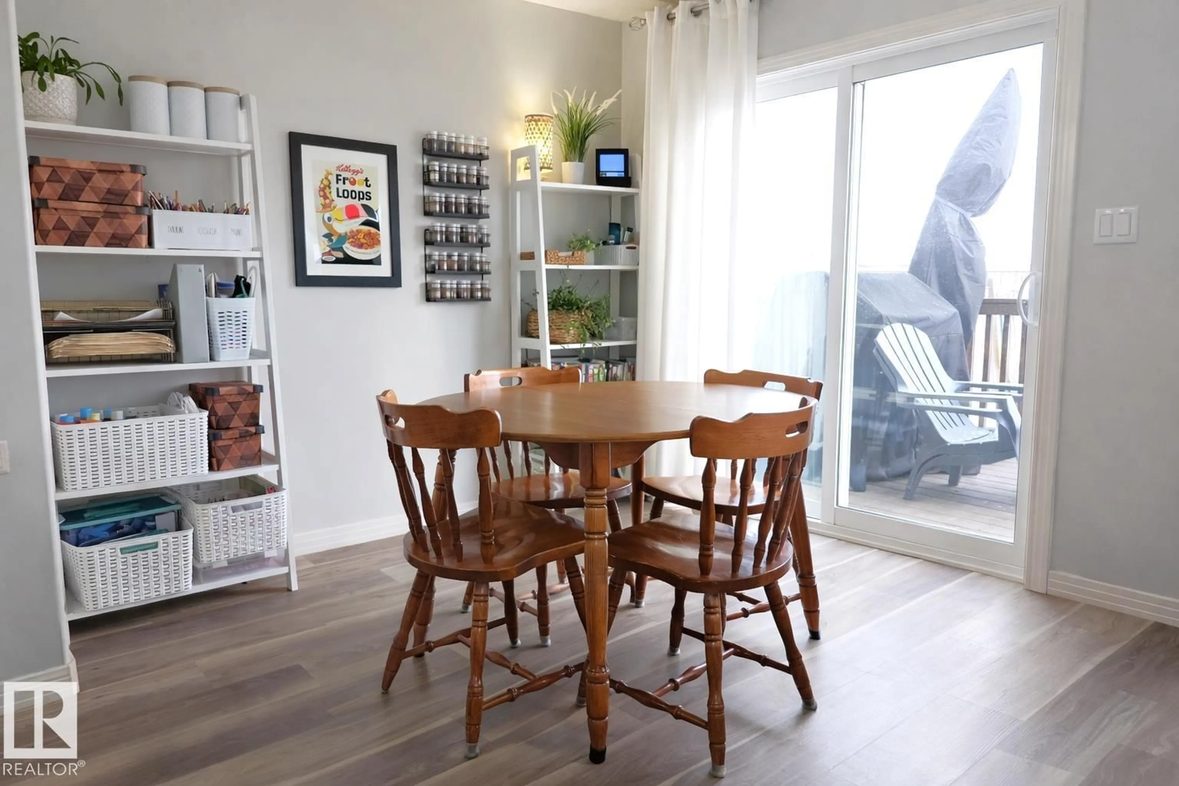 Dining room, wood/laminate floor for NW - 2151 28 ST, Edmonton Alberta T6T0K1
