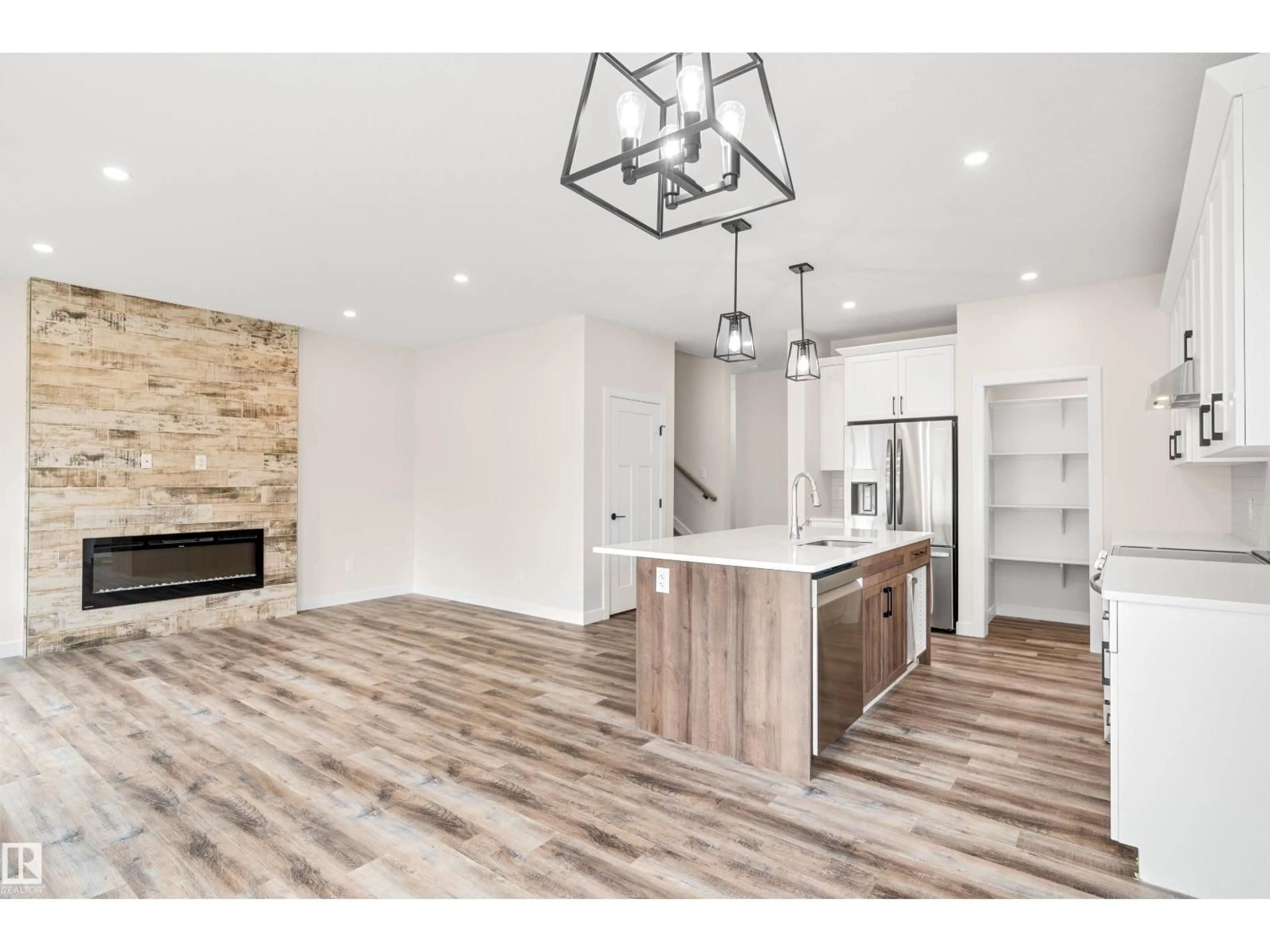 Open concept kitchen, wood/laminate floor for 5121 53A AV, Legal Alberta T0G1L0