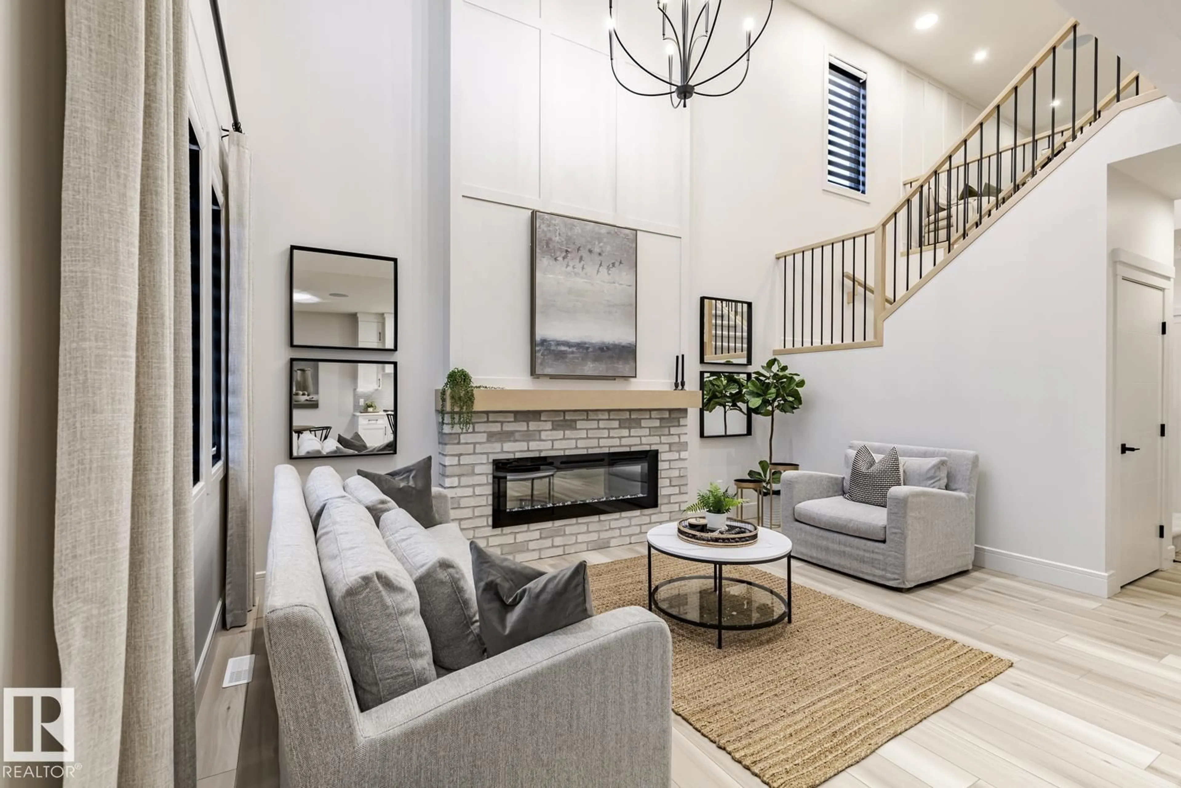 Living room with furniture, unknown for 6275 180 AV, Edmonton Alberta T5Y3X1