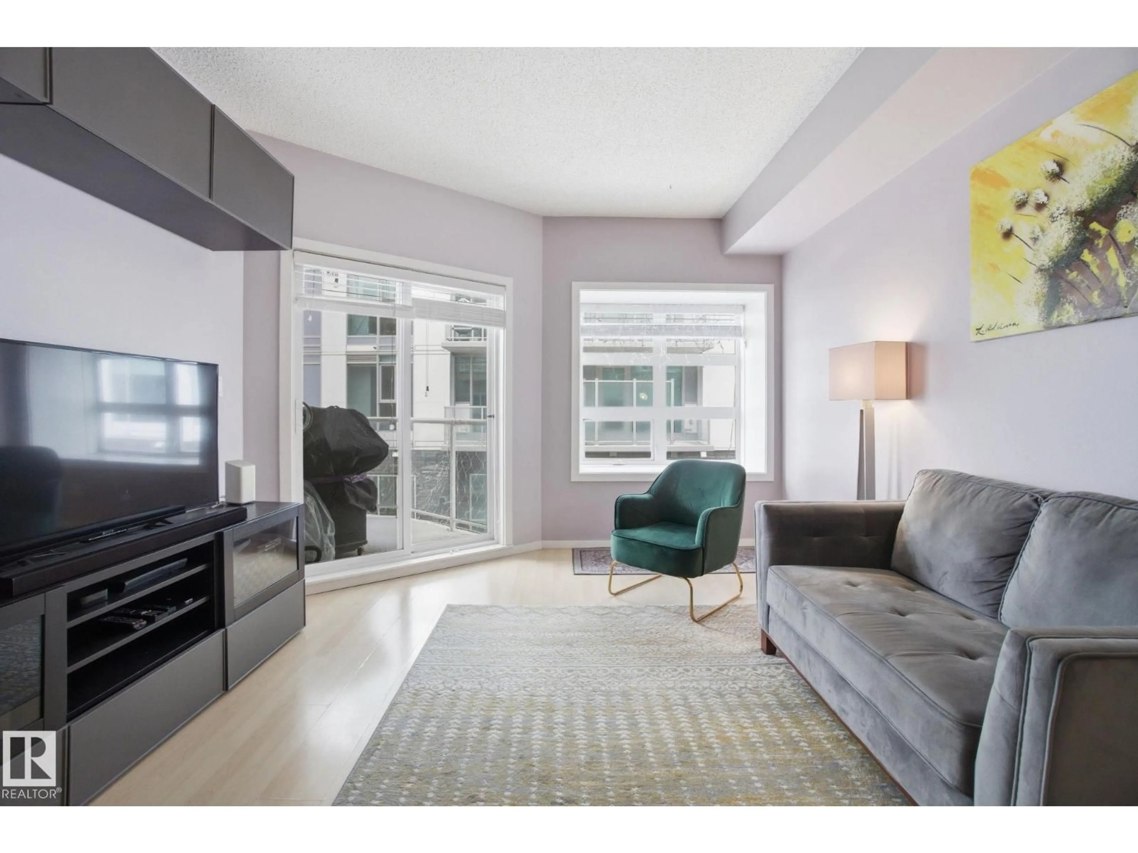 Living room with furniture, unknown for 205 9910 111 ST NW, Edmonton Alberta T5K1K2