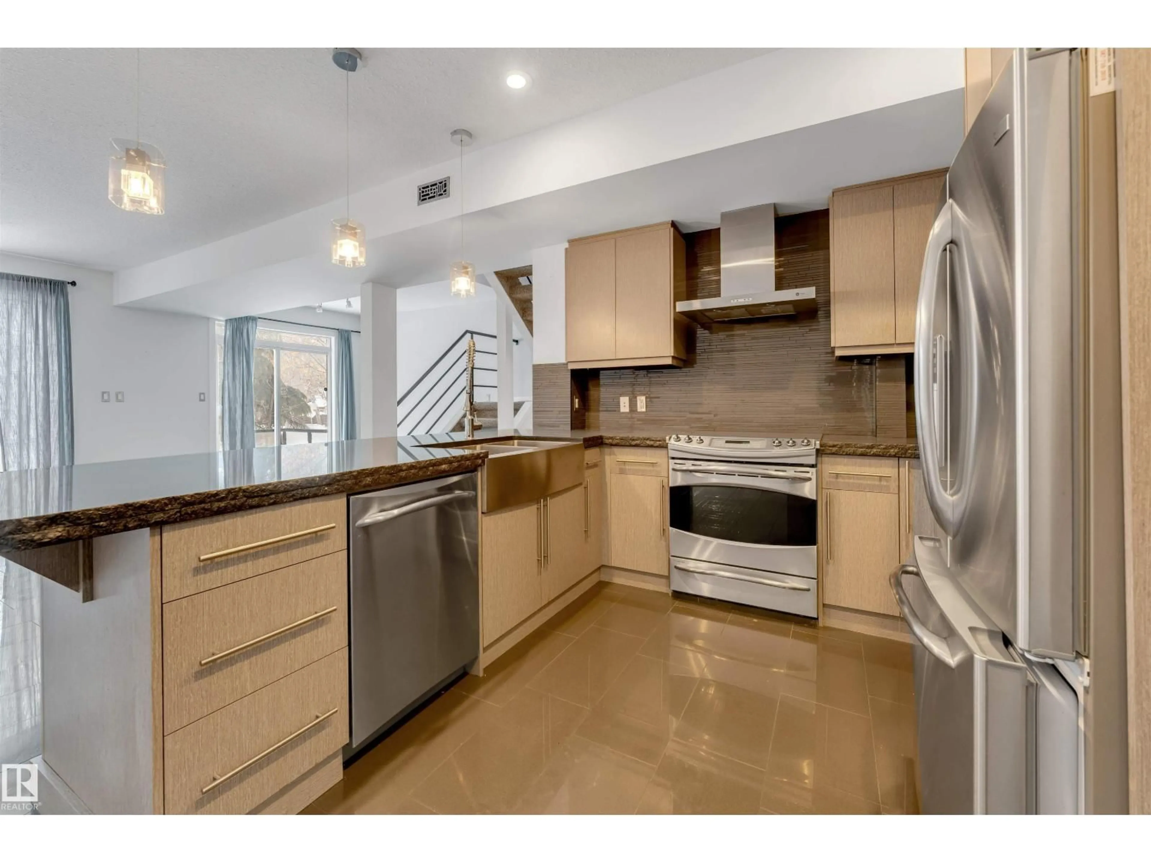 Open concept kitchen, ceramic/tile floor for #102 - 10711 83 AV, Edmonton Alberta T6E2E5