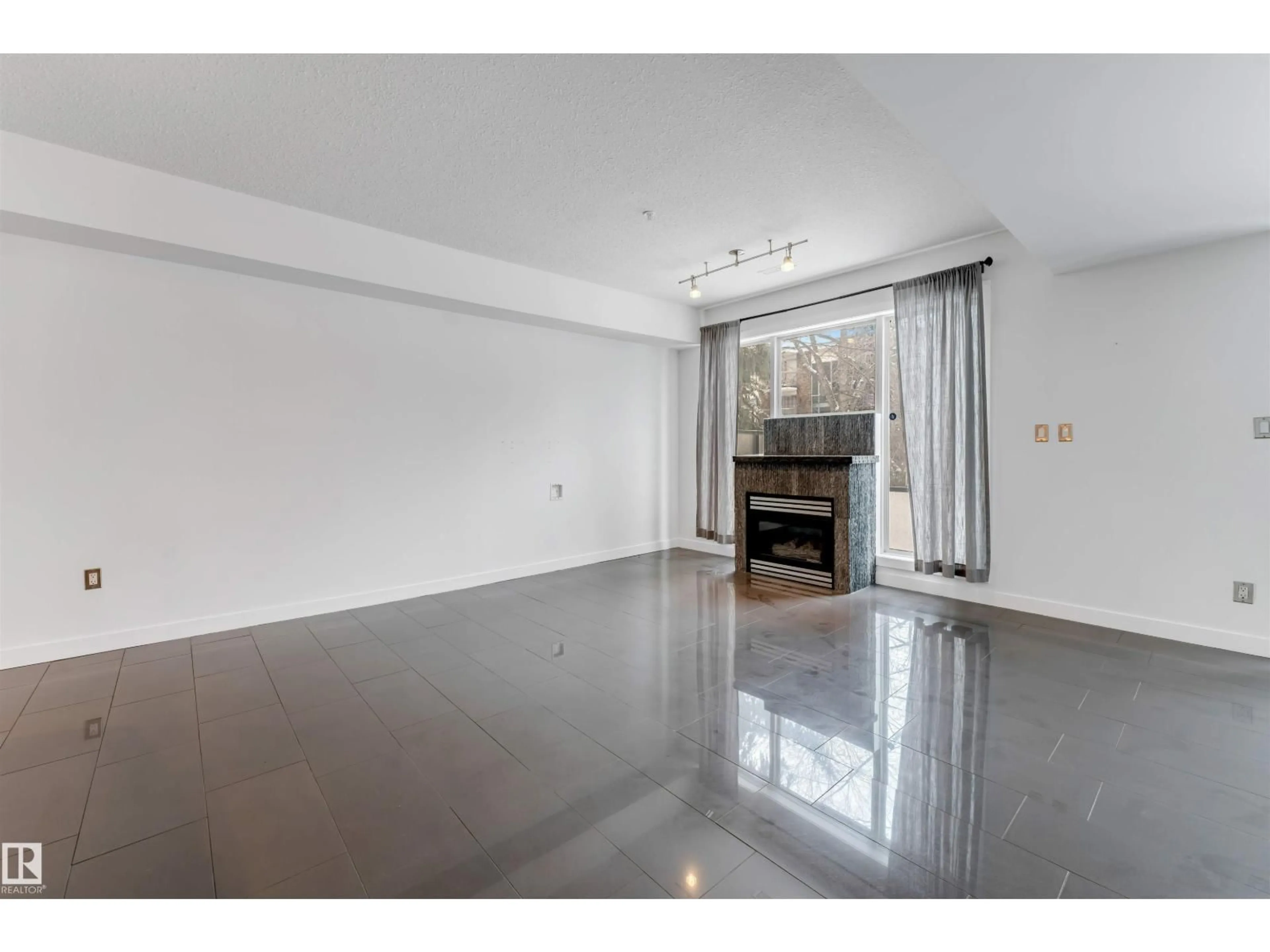 A pic of a room for #102 - 10711 83 AV, Edmonton Alberta T6E2E5