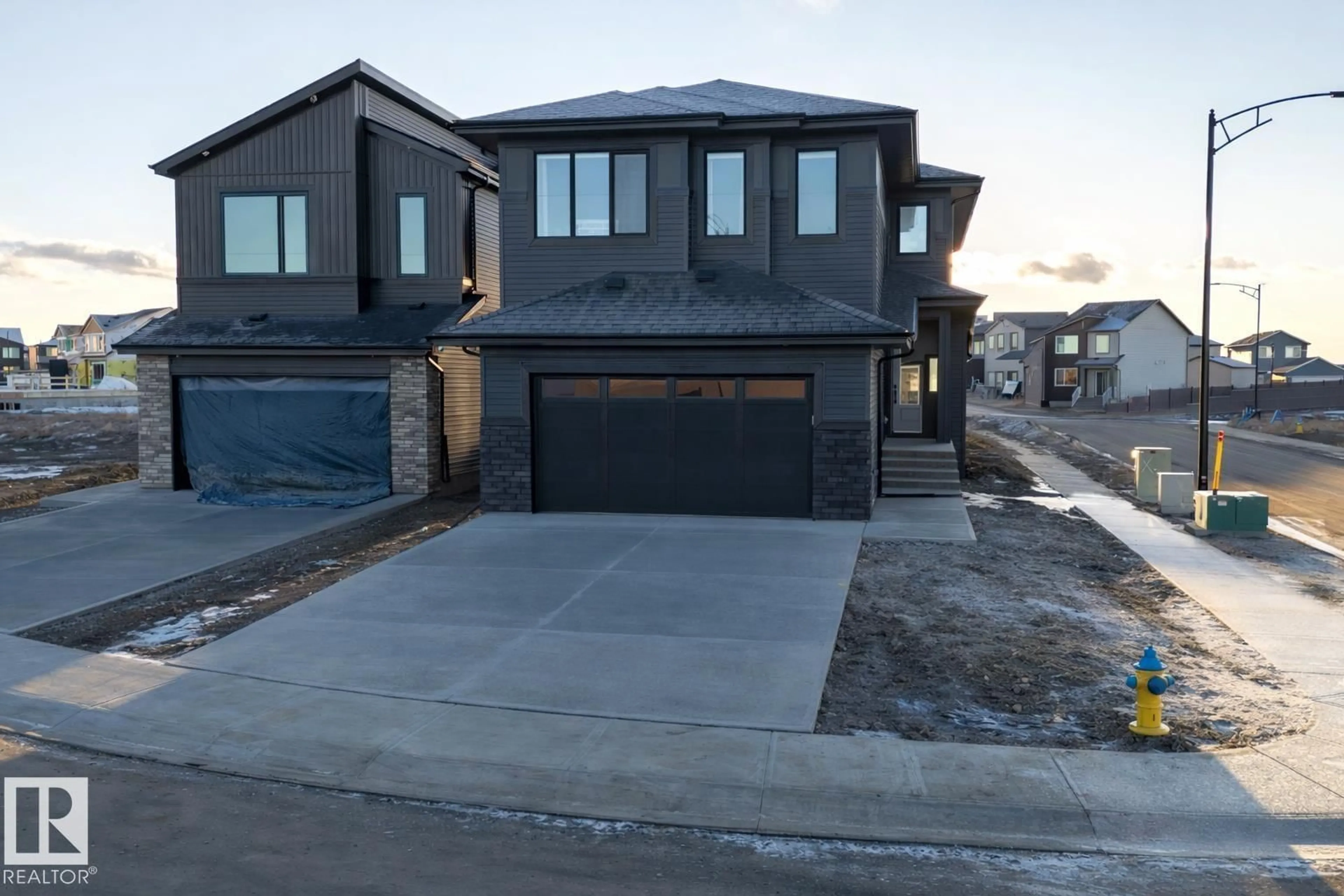 Home with brick exterior material, street for SW - 213 PATERSON LI, Edmonton Alberta T6W5V3