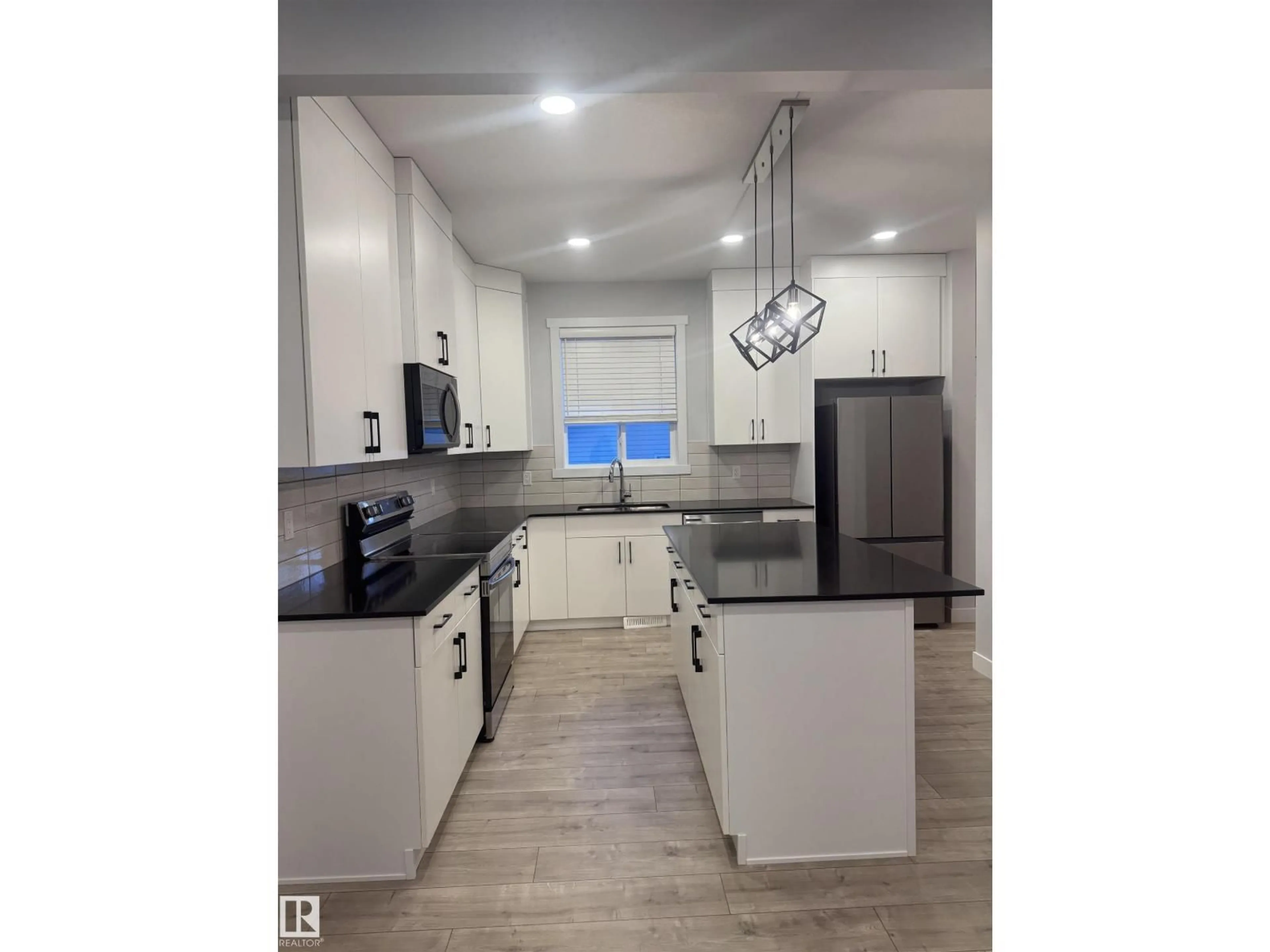 Open concept kitchen, unknown for 5316 GODSON PT, Edmonton Alberta T5T4P8
