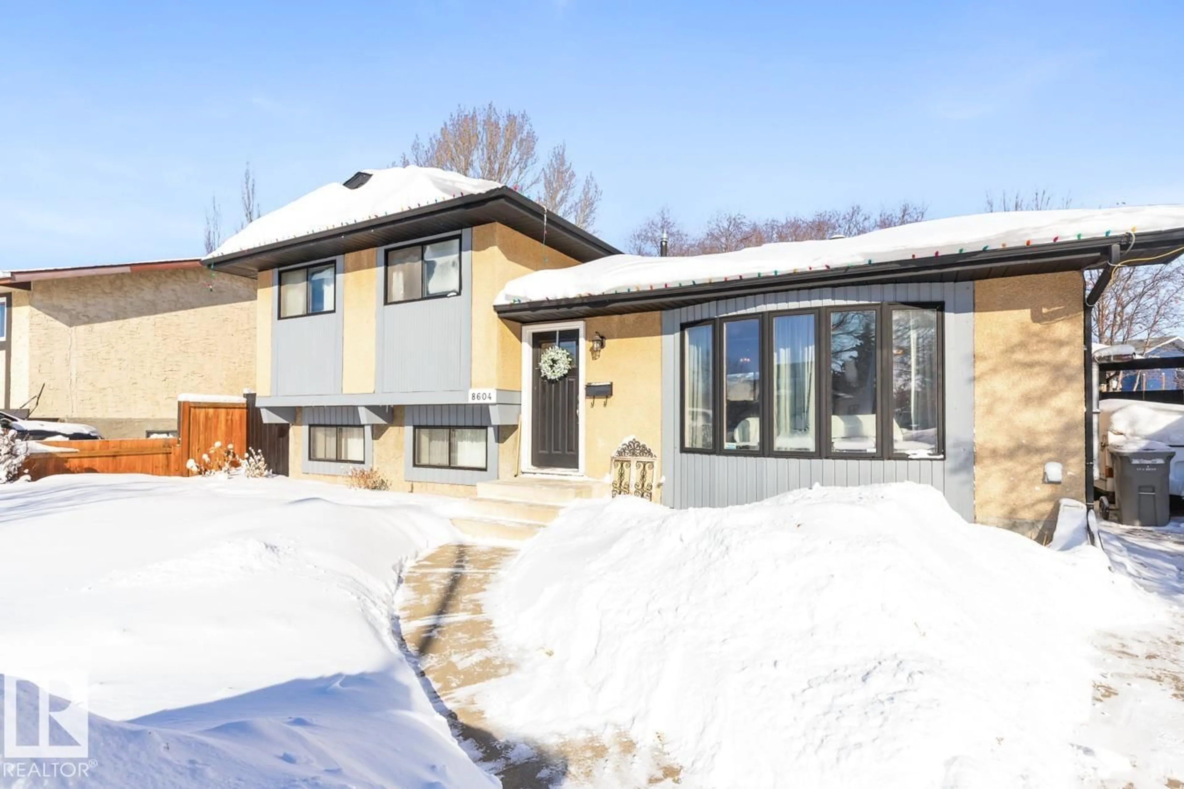 Home with brick exterior material, street for 8604 104 AV, Morinville Alberta T8R1C1