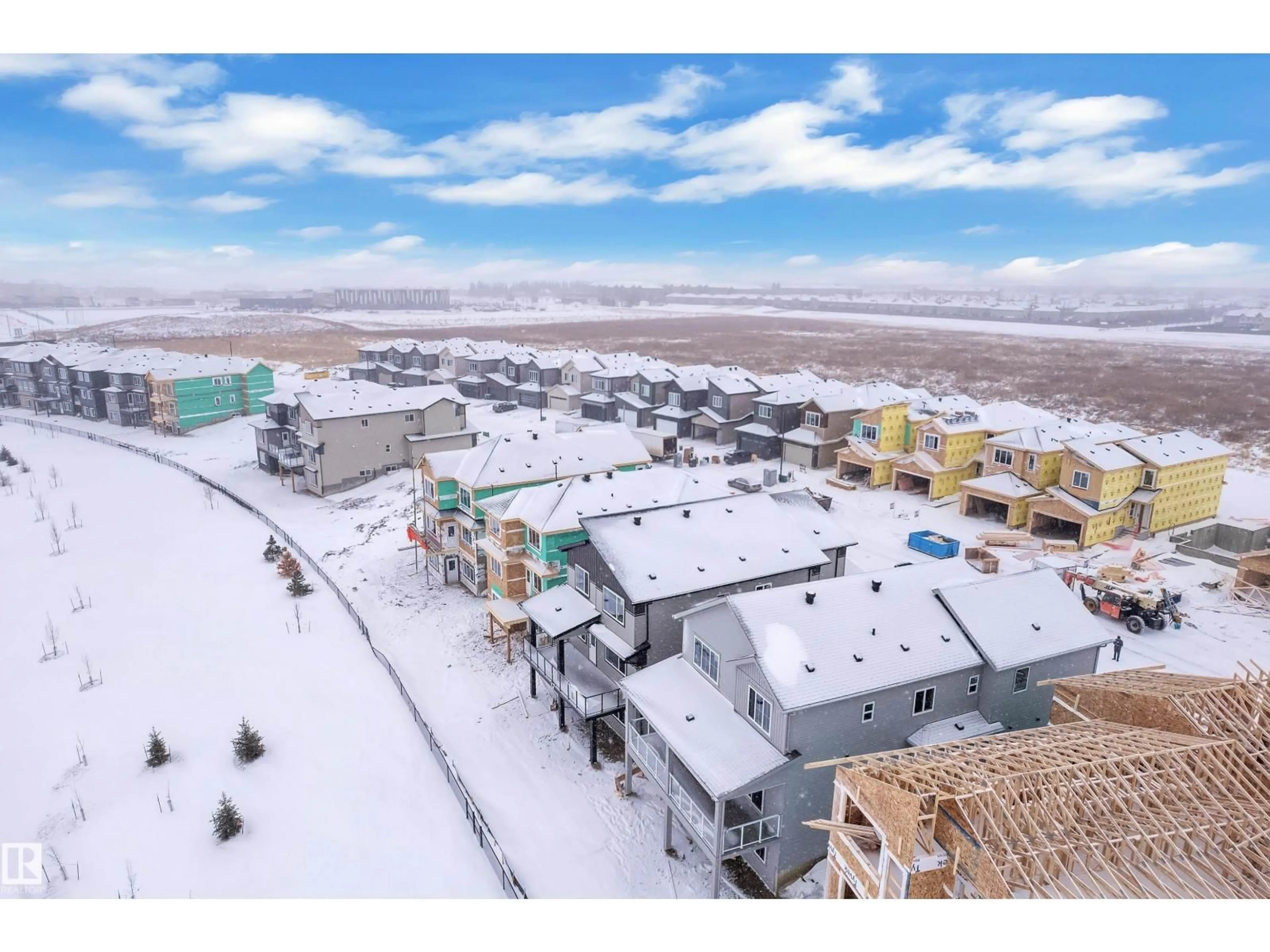 A pic from outside/outdoor area/front of a property/back of a property/a pic from drone, mountain view for 231 CRYSTAL CREEK DR, Leduc Alberta T9E0X6