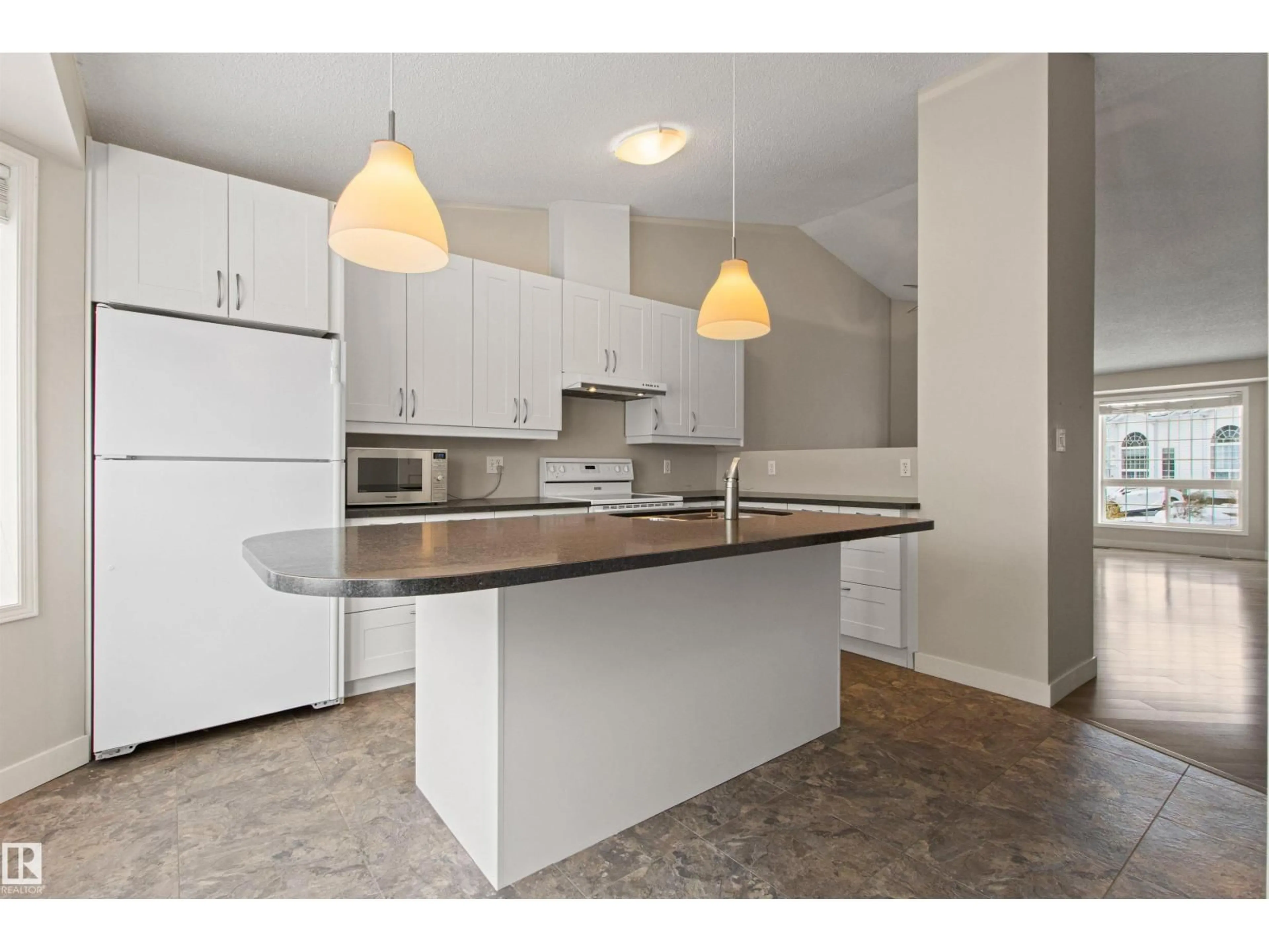 Open concept kitchen, unknown for #23 - 3311 58 ST, Edmonton Alberta T6L6X3