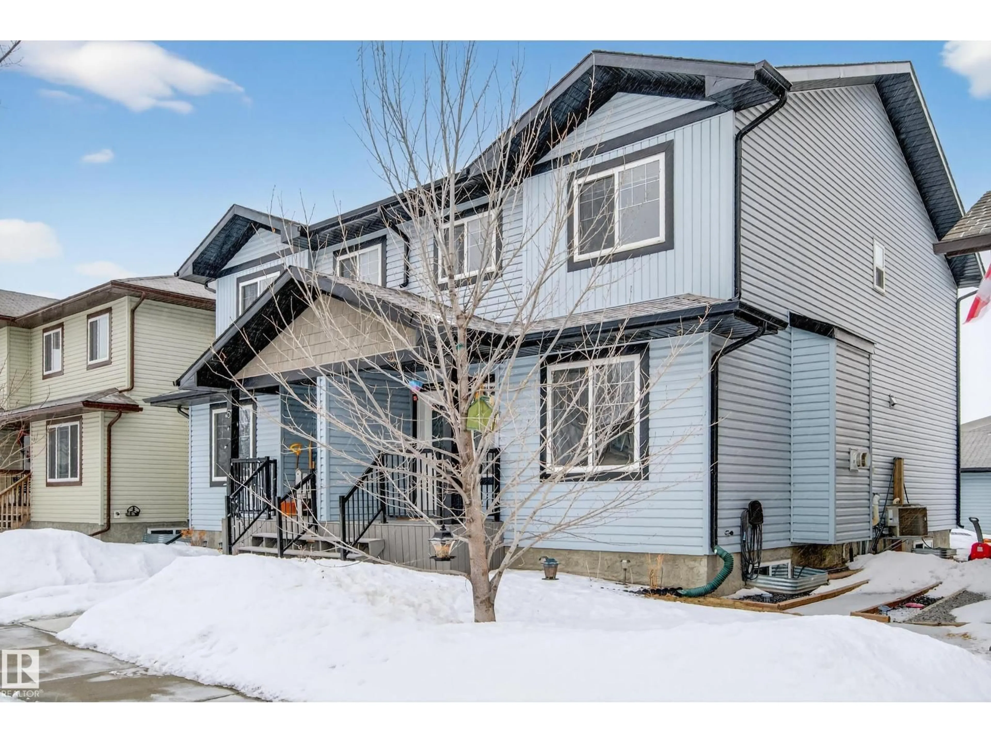 Home with vinyl exterior material, street for 7 RADCLIFFE WD, Fort Saskatchewan Alberta T8L0M6