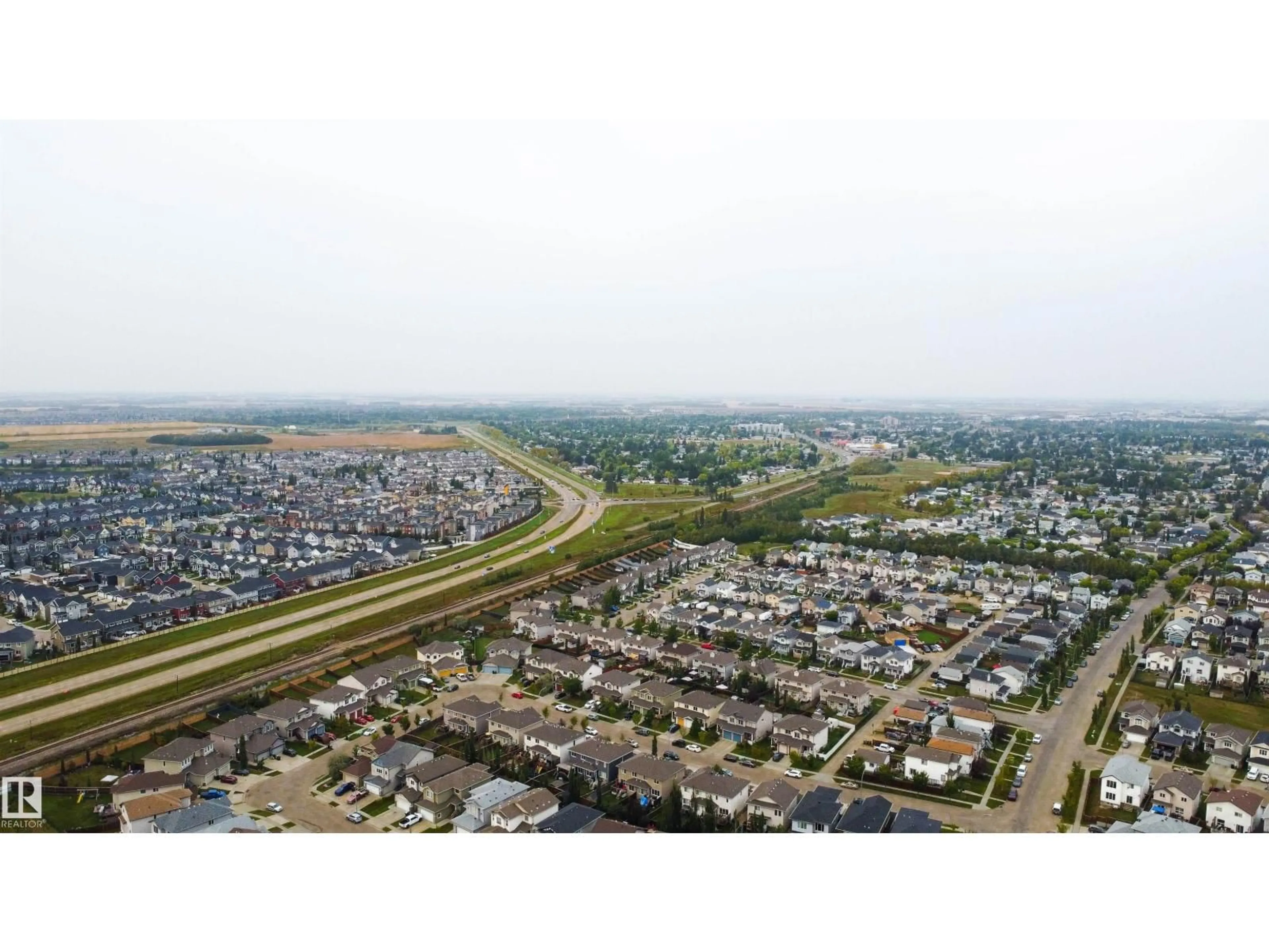 A pic from outside/outdoor area/front of a property/back of a property/a pic from drone, street for 182 CALEDONIA DR, Leduc Alberta T9E0J9