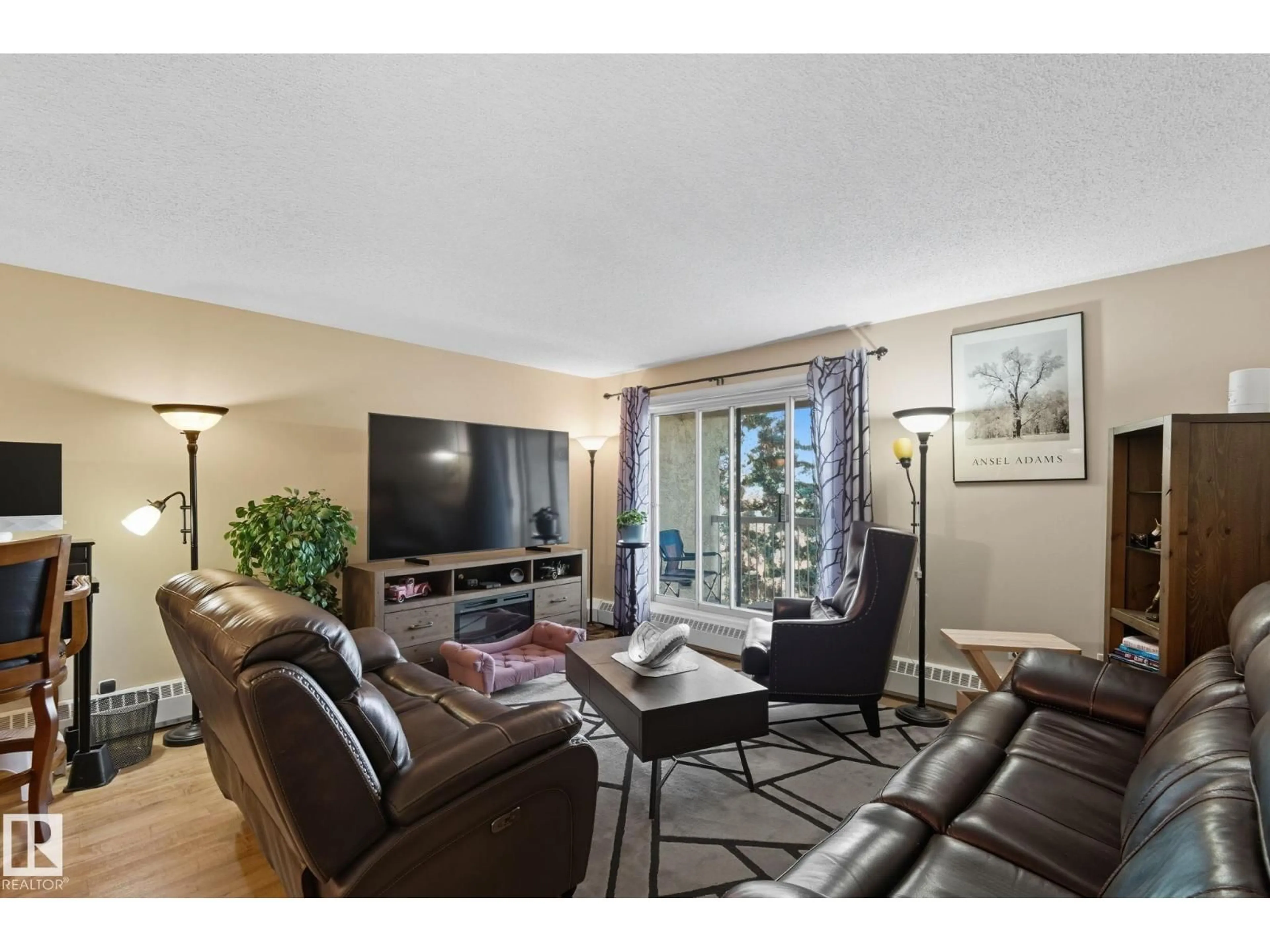 Living room with furniture, unknown for 411 18004 95 AVE NW, Edmonton Alberta T5T5W3