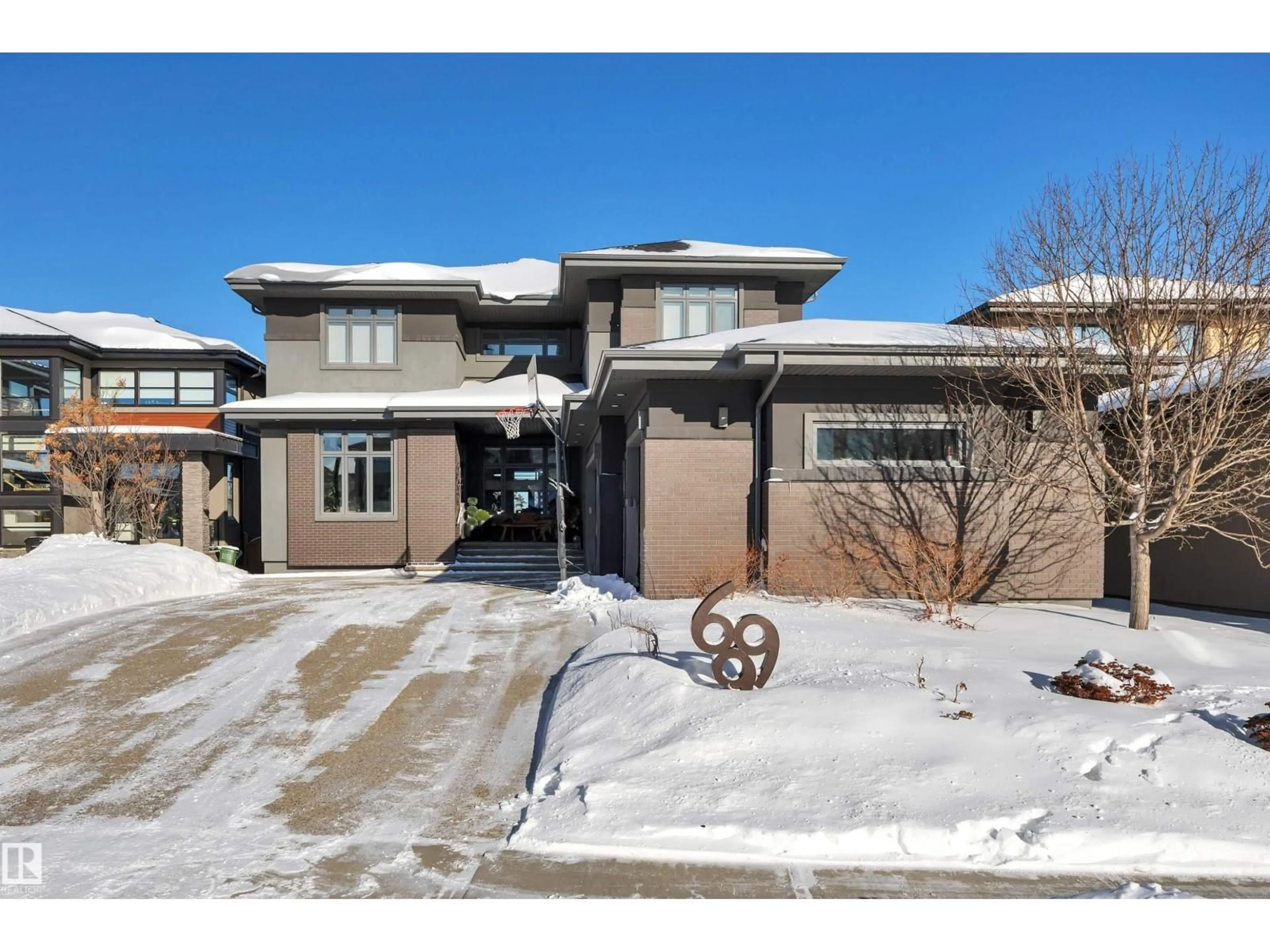 Home with brick exterior material, street for 699 HOWATT DR, Edmonton Alberta T6W3K3