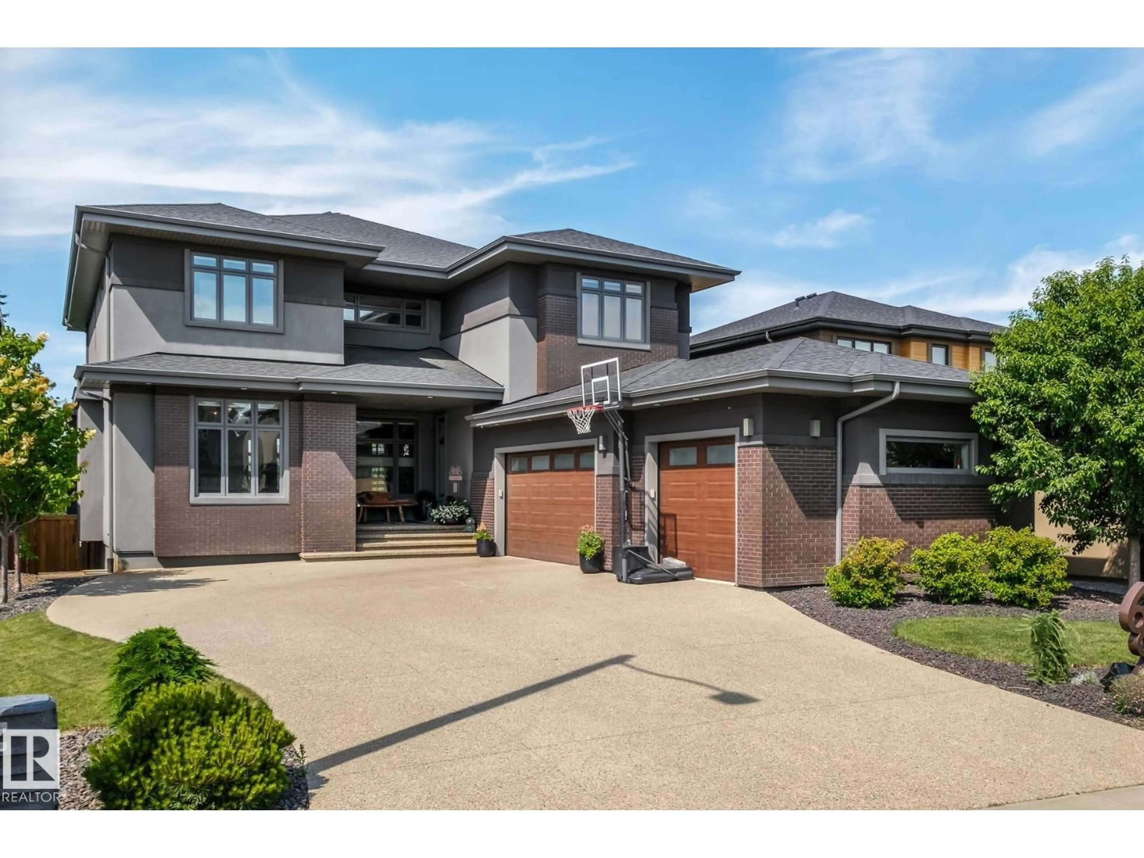 Home with brick exterior material, street for 699 HOWATT DR, Edmonton Alberta T6W3K3