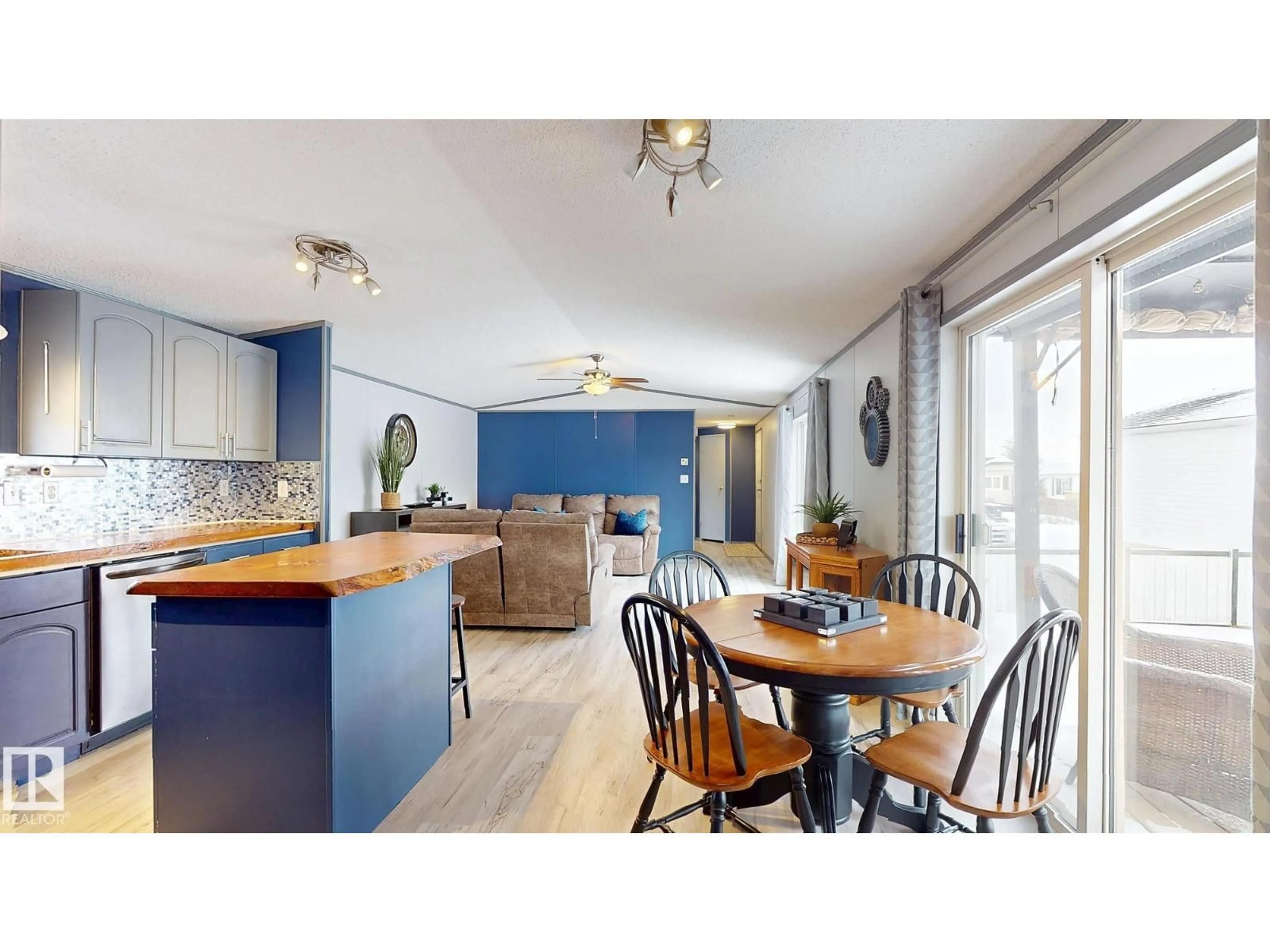 Open concept kitchen, wood/laminate floor for 9 SUNSET BV, Spruce Grove Alberta T7X3J1