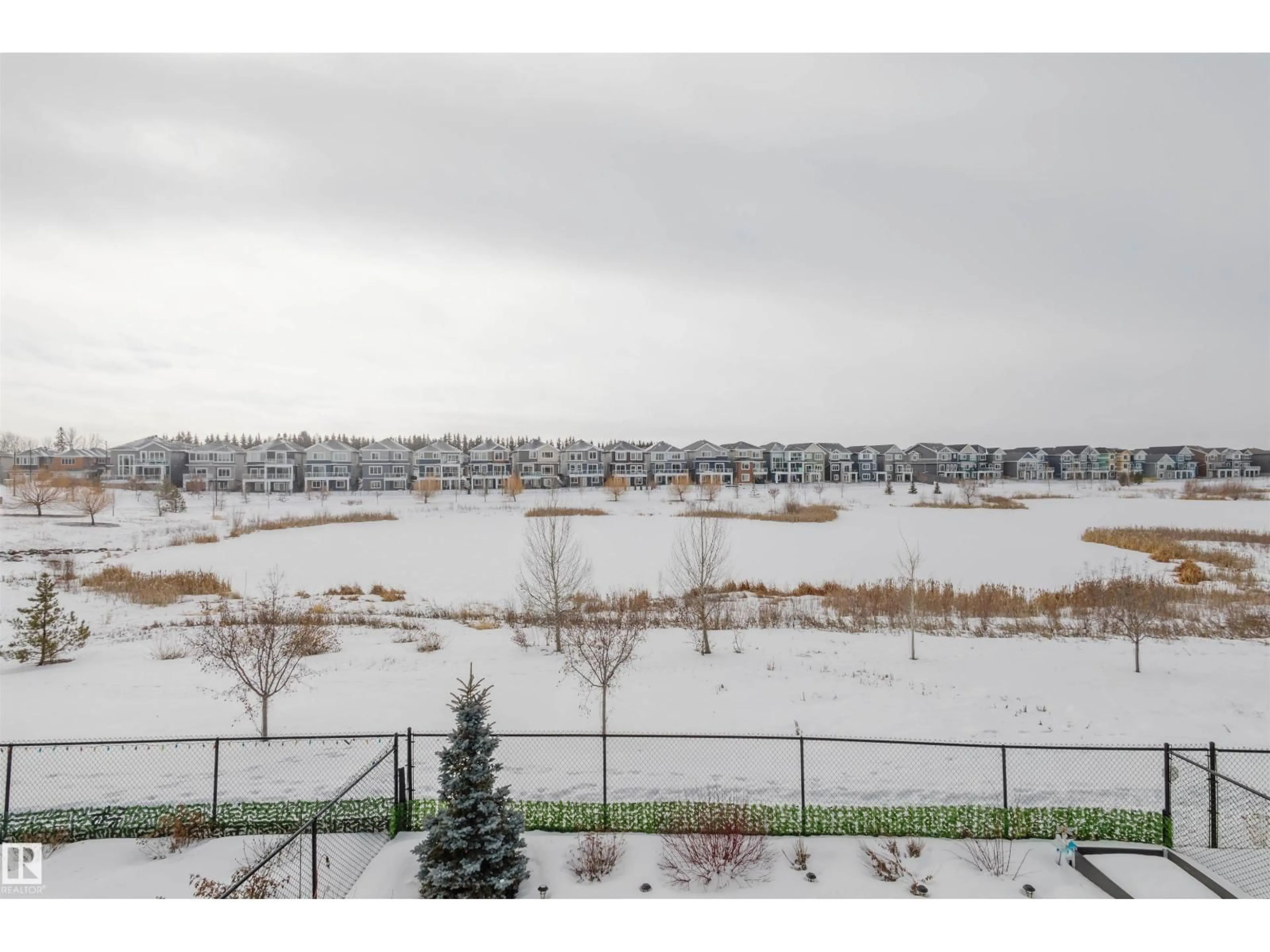 A pic from outside/outdoor area/front of a property/back of a property/a pic from drone, water/lake/river/ocean view for 16217 32 AV, Edmonton Alberta T6W4P2