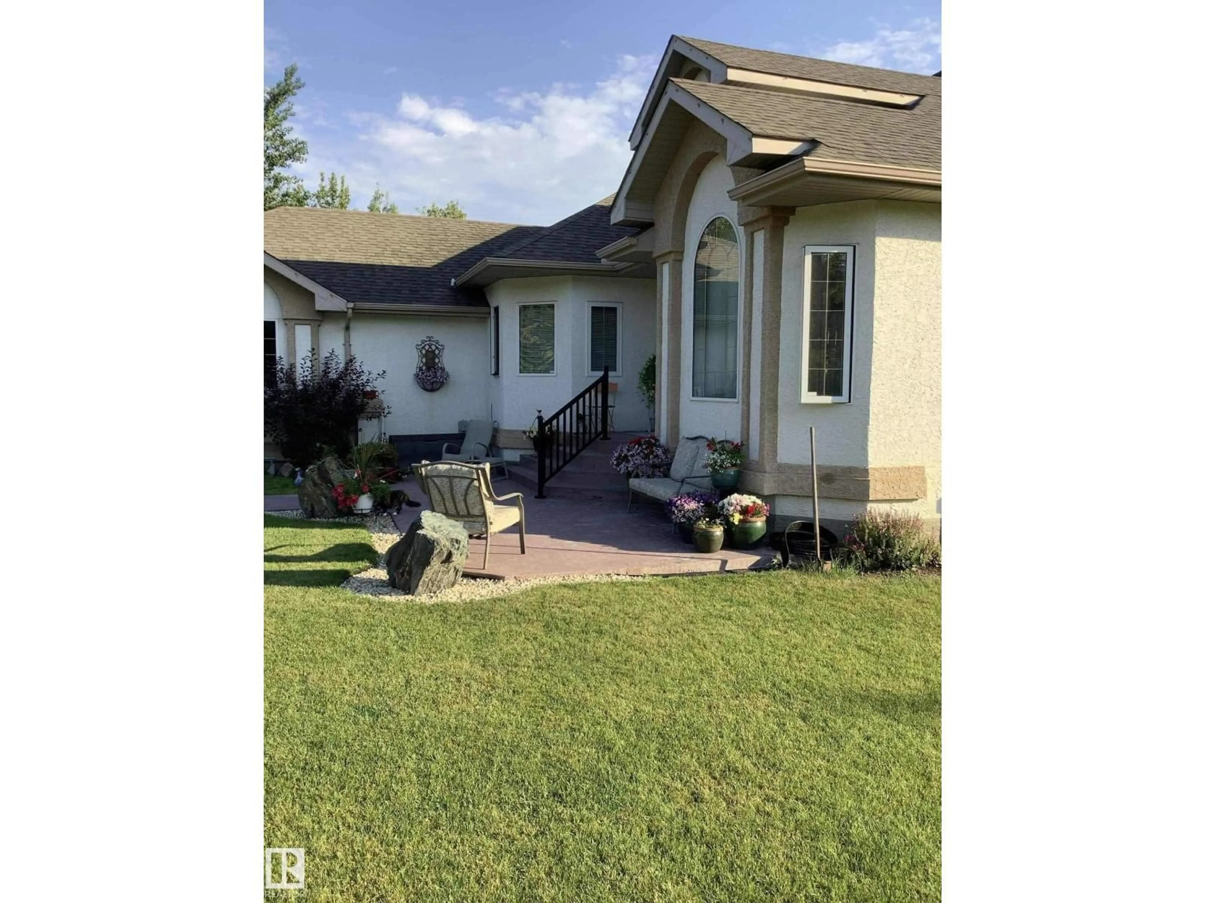 Home with vinyl exterior material, street for 21366 TWP ROAD 530, Rural Strathcona County Alberta T8G2G1