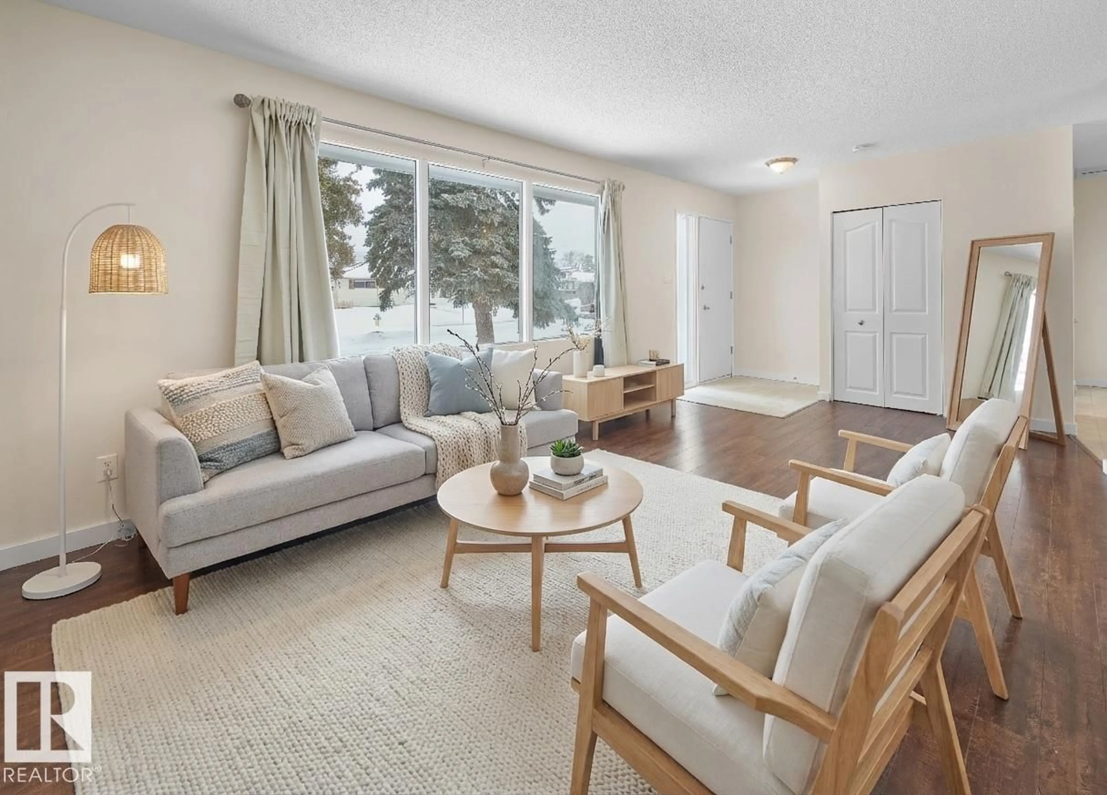 Living room with furniture, unknown for 10531 52 AV, Edmonton Alberta T6H3A7