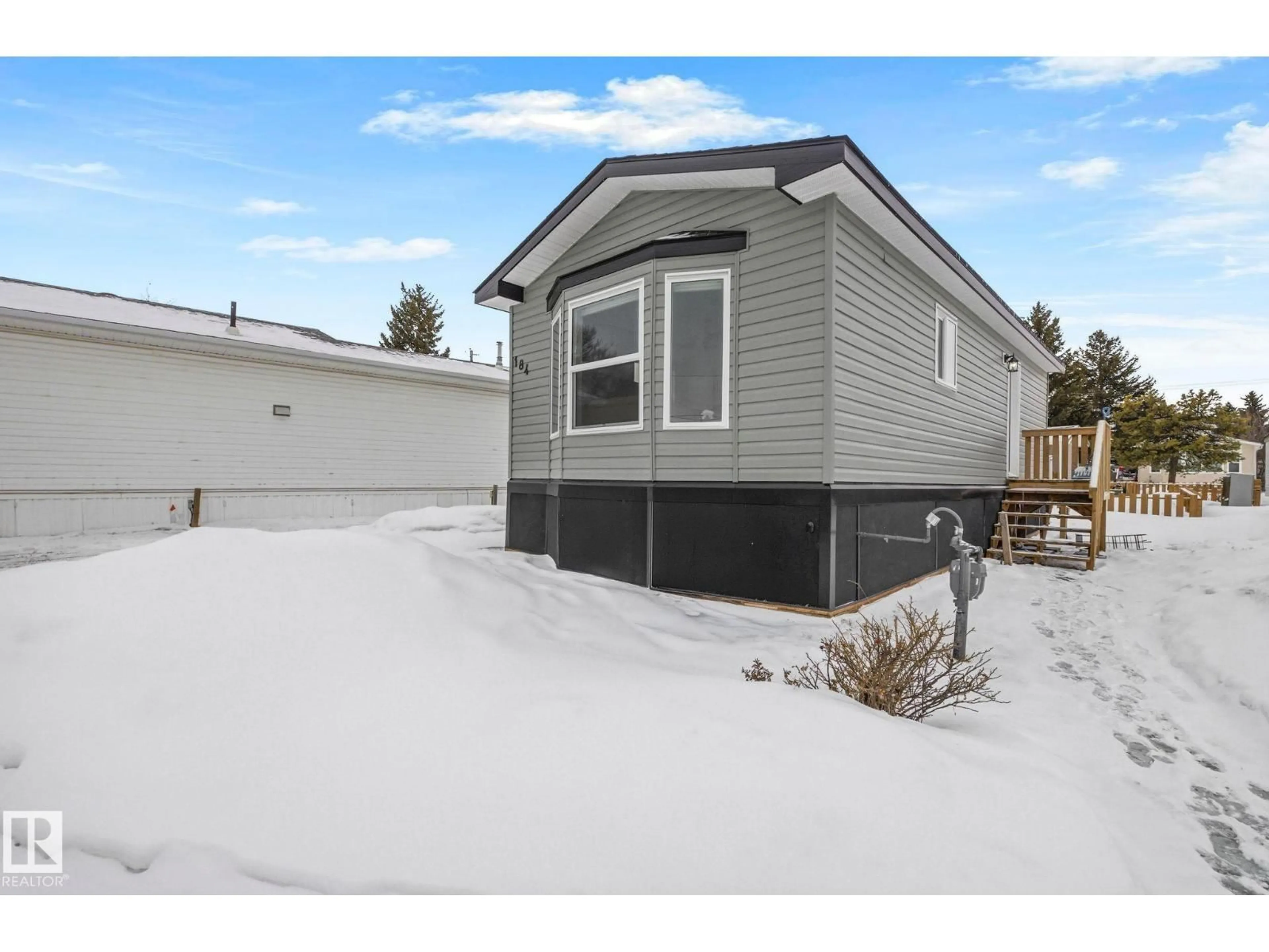 Home with vinyl exterior material, street for 305 - 184 CALAHOO RD, Spruce Grove Alberta T7X3L1