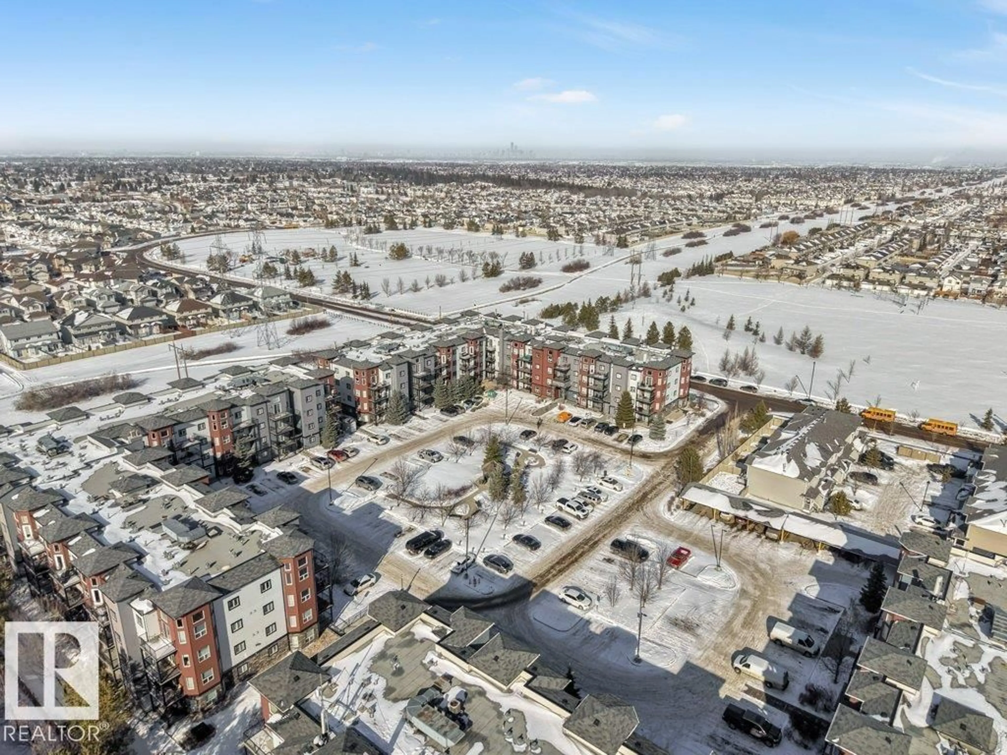 A pic from outside/outdoor area/front of a property/back of a property/a pic from drone, unknown for #101 - 400 SILVER BERRY RD, Edmonton Alberta T6T0H1
